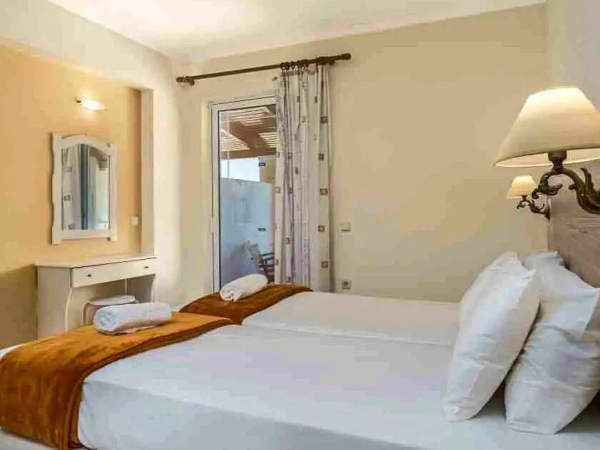 Bed in Manousis ApartHotel