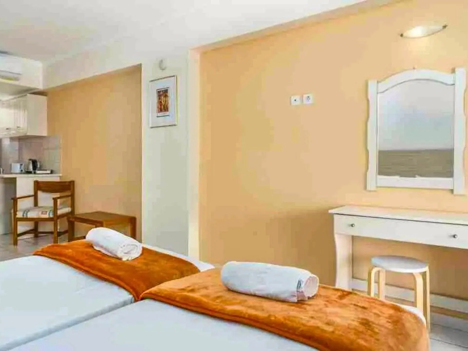 Bed in Manousis ApartHotel