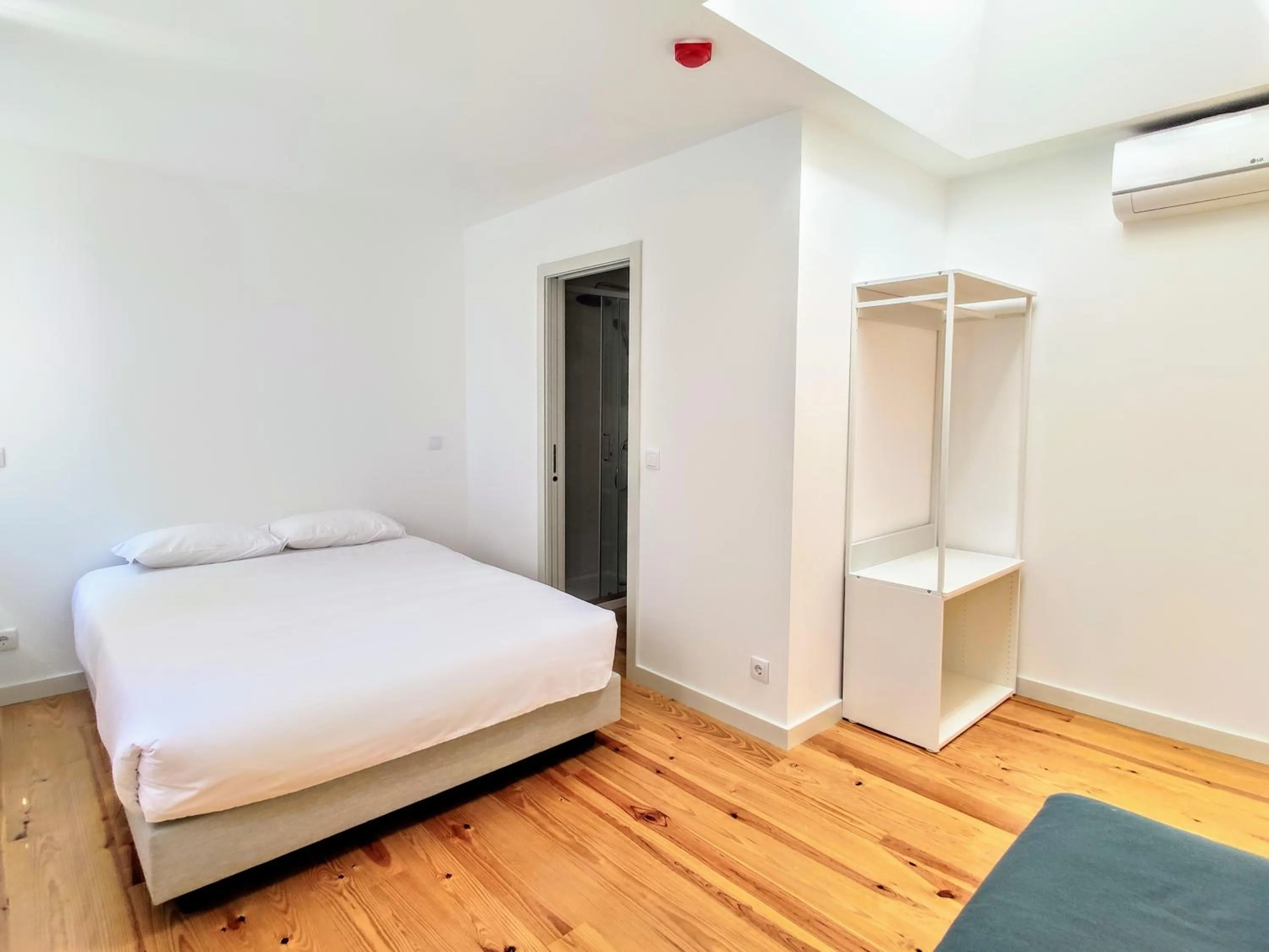 Bed in Bombarda Cinema Apartments