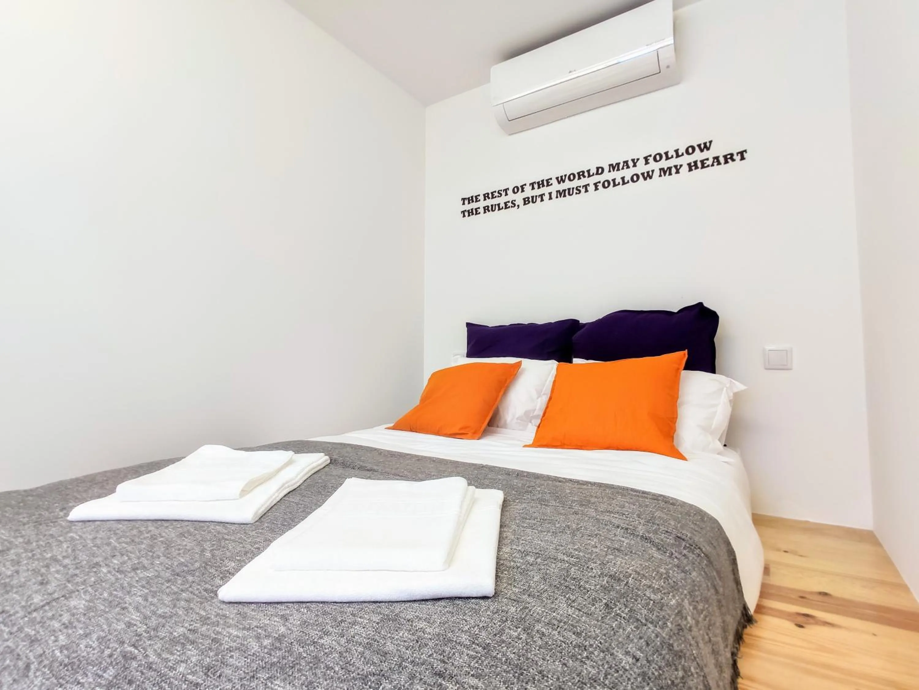 Bedroom in Bombarda Cinema Apartments