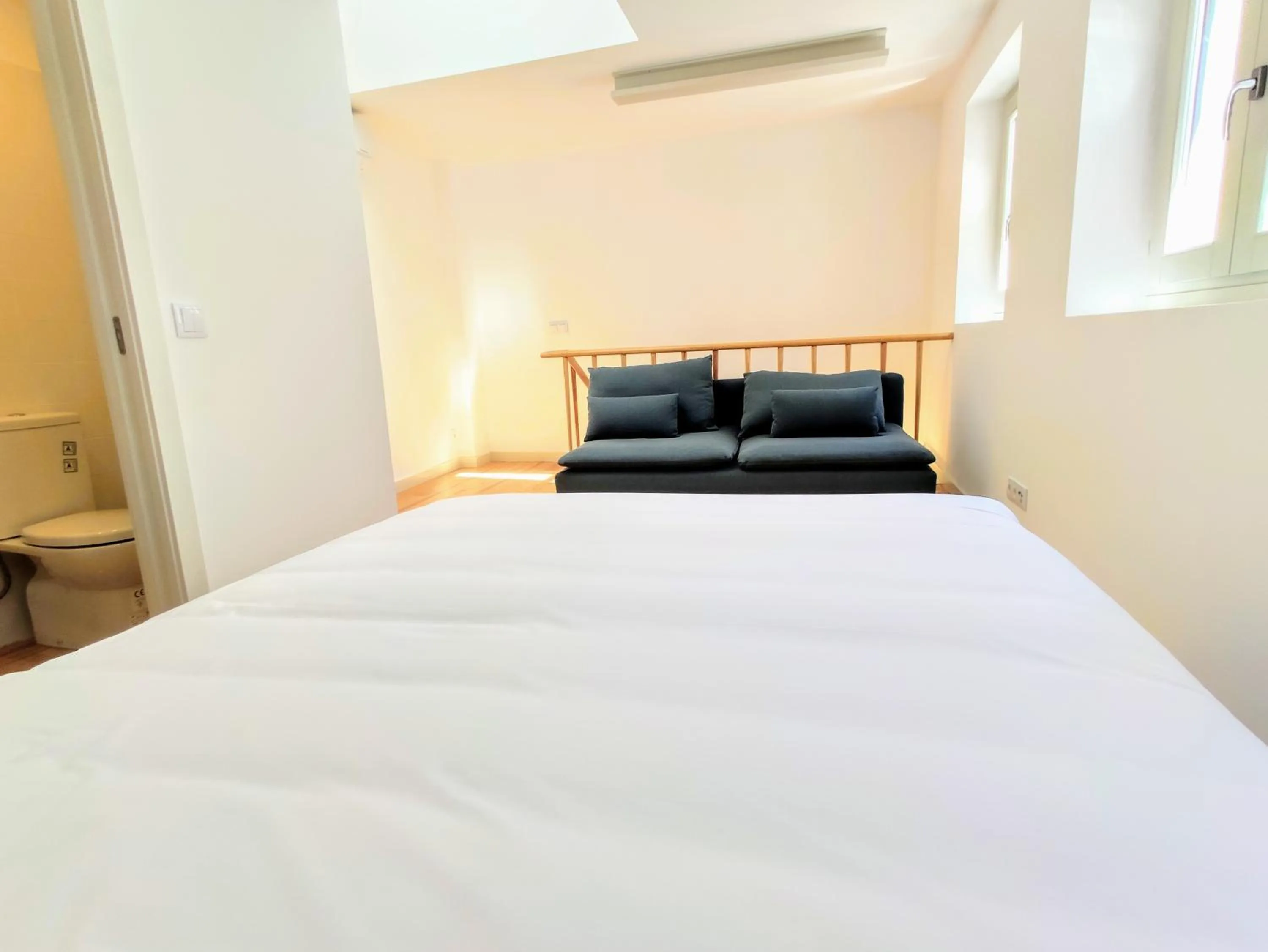 Bed in Bombarda Cinema Apartments