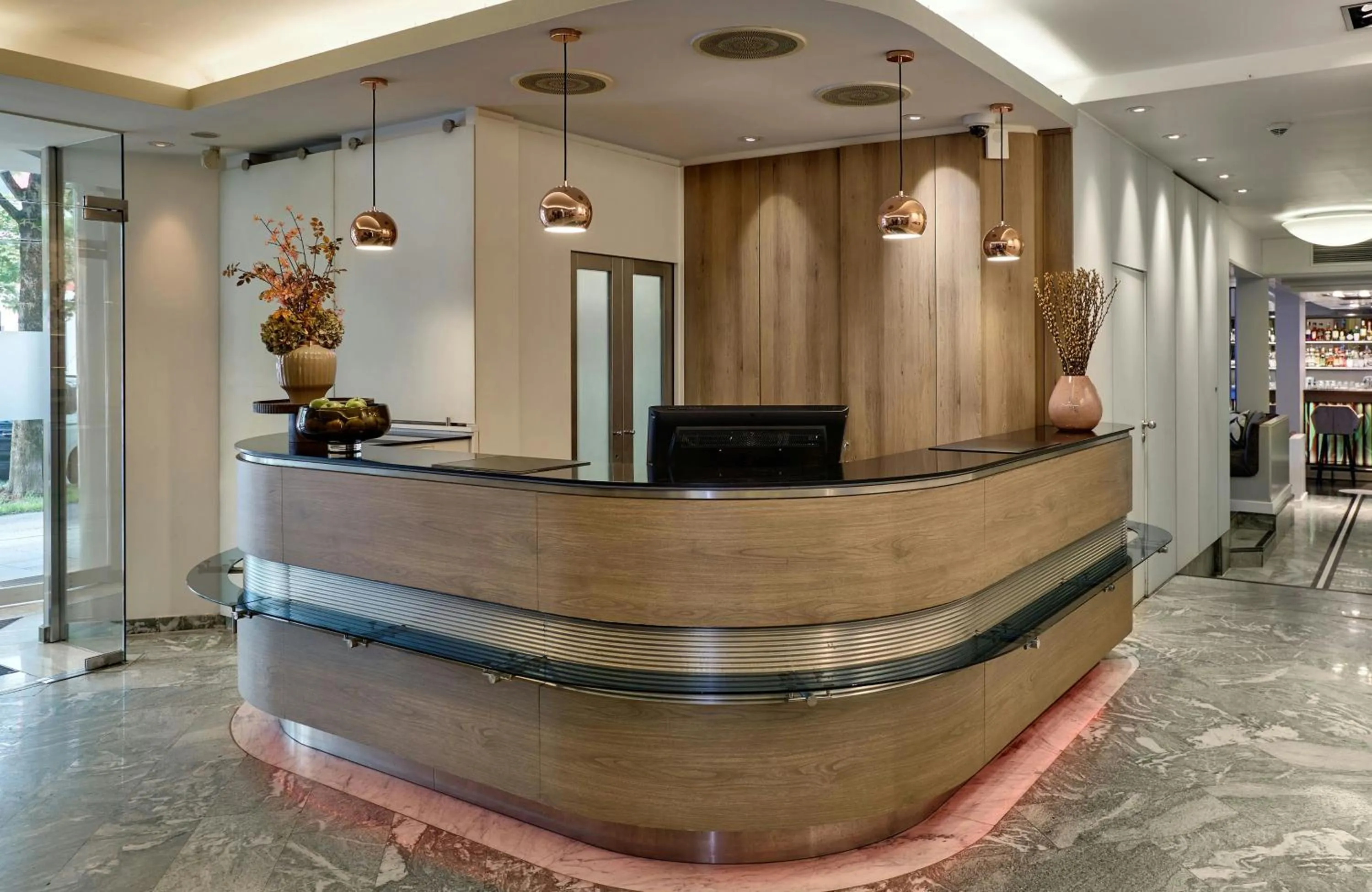Lobby or reception in Leonardo Hotel München City West