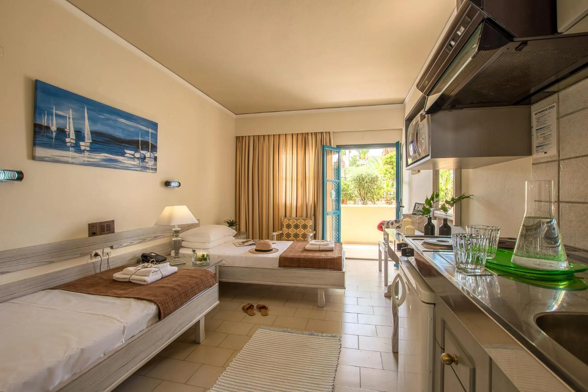 Kitchen or kitchenette, Bed in Dedalos Hotel