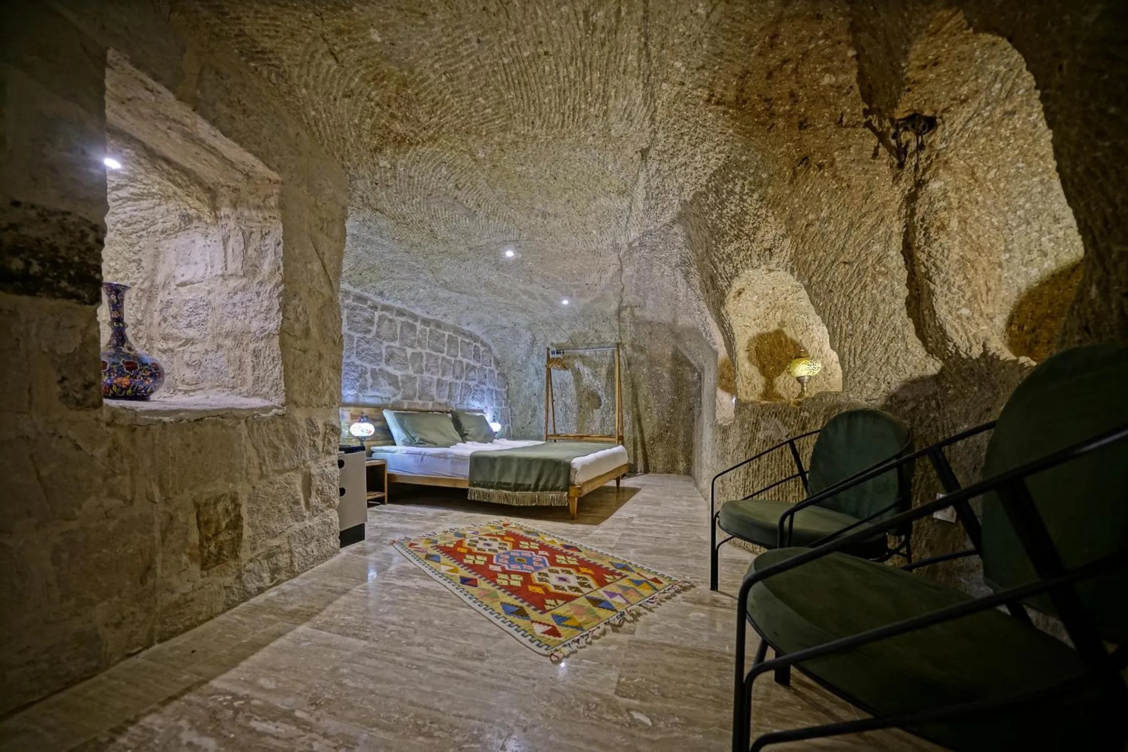 Bed in Vigneron Cave Hotel