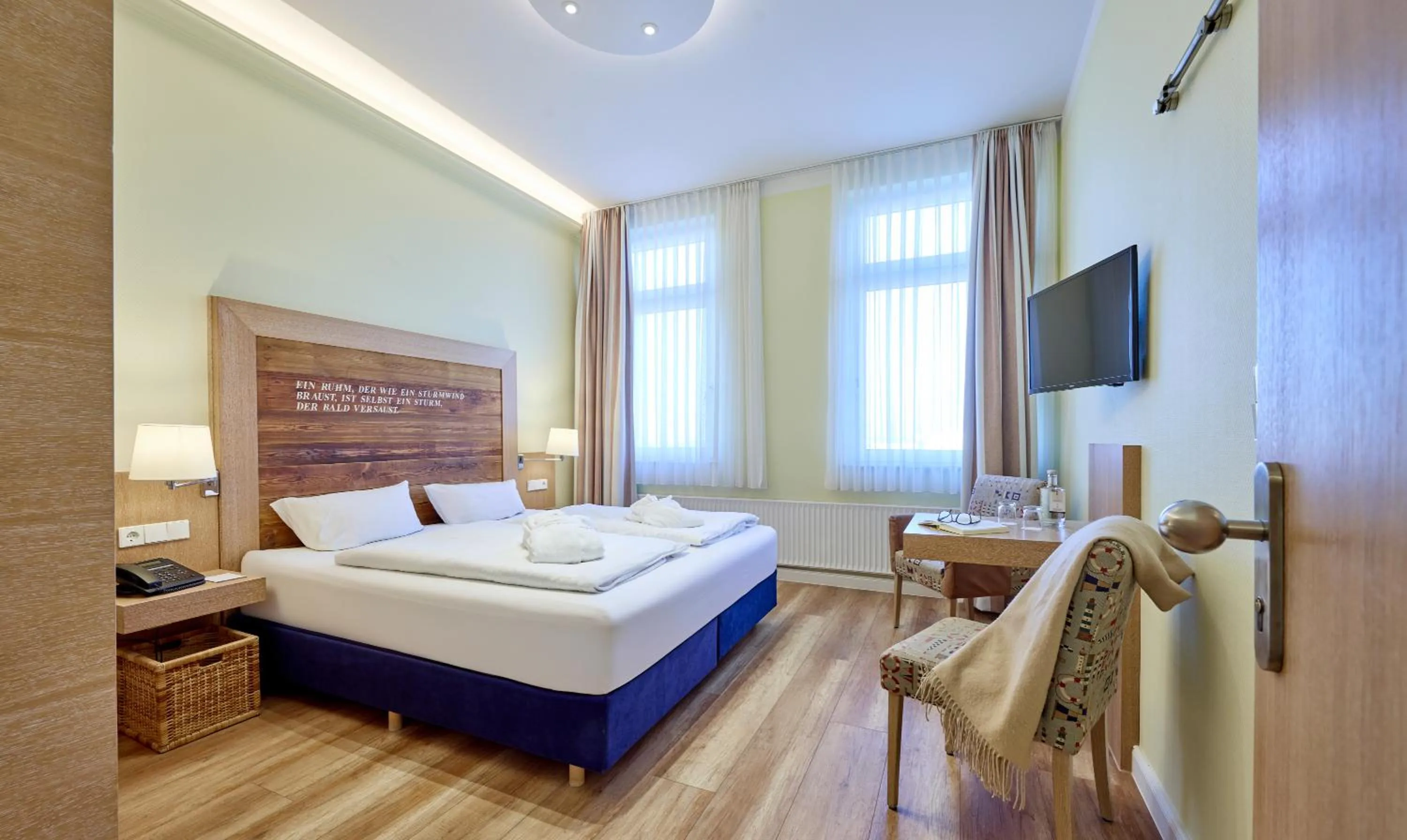 Photo of the whole room, Bed in Strandhotel VierJahresZeiten