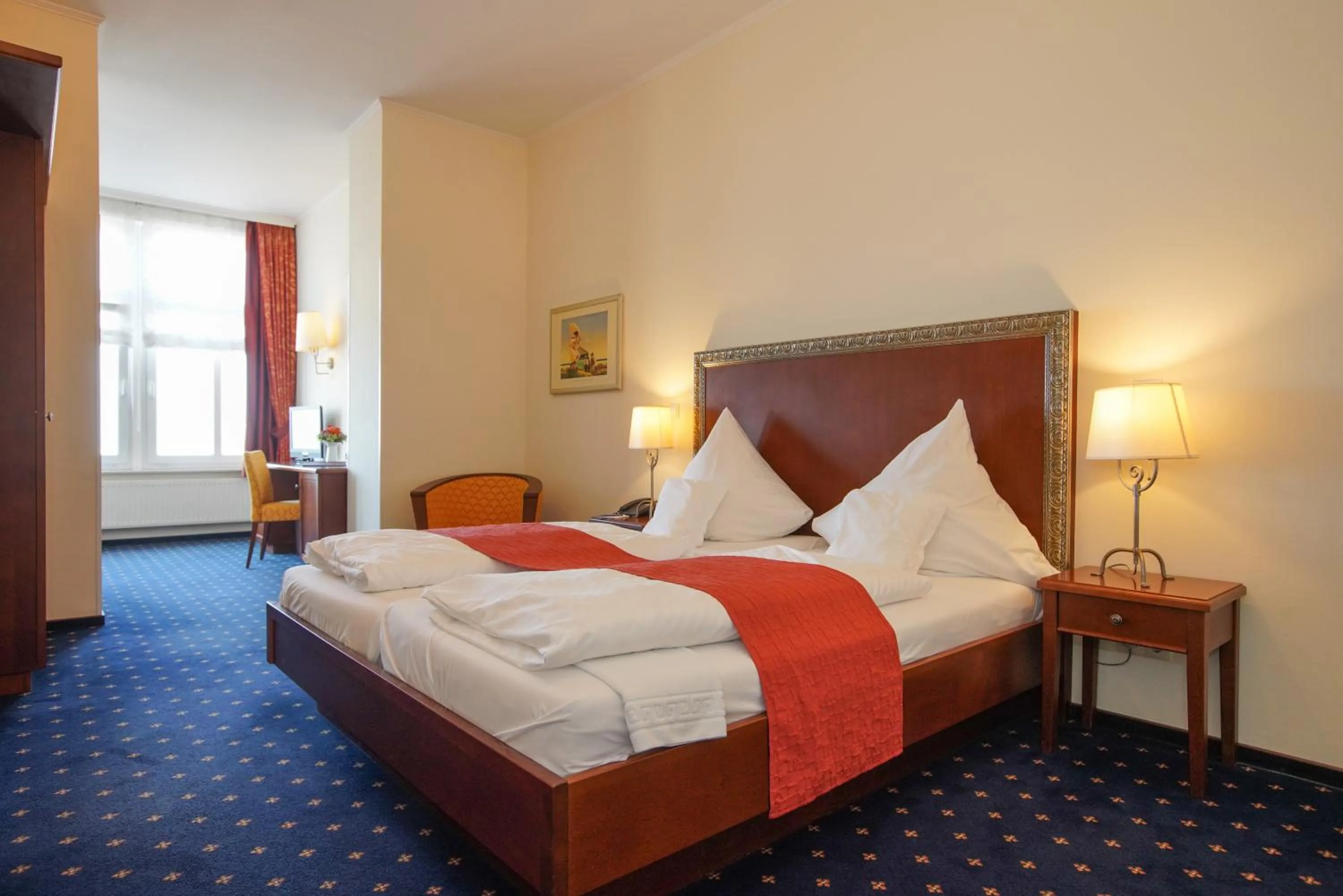 Photo of the whole room, Bed in Strandhotel VierJahresZeiten