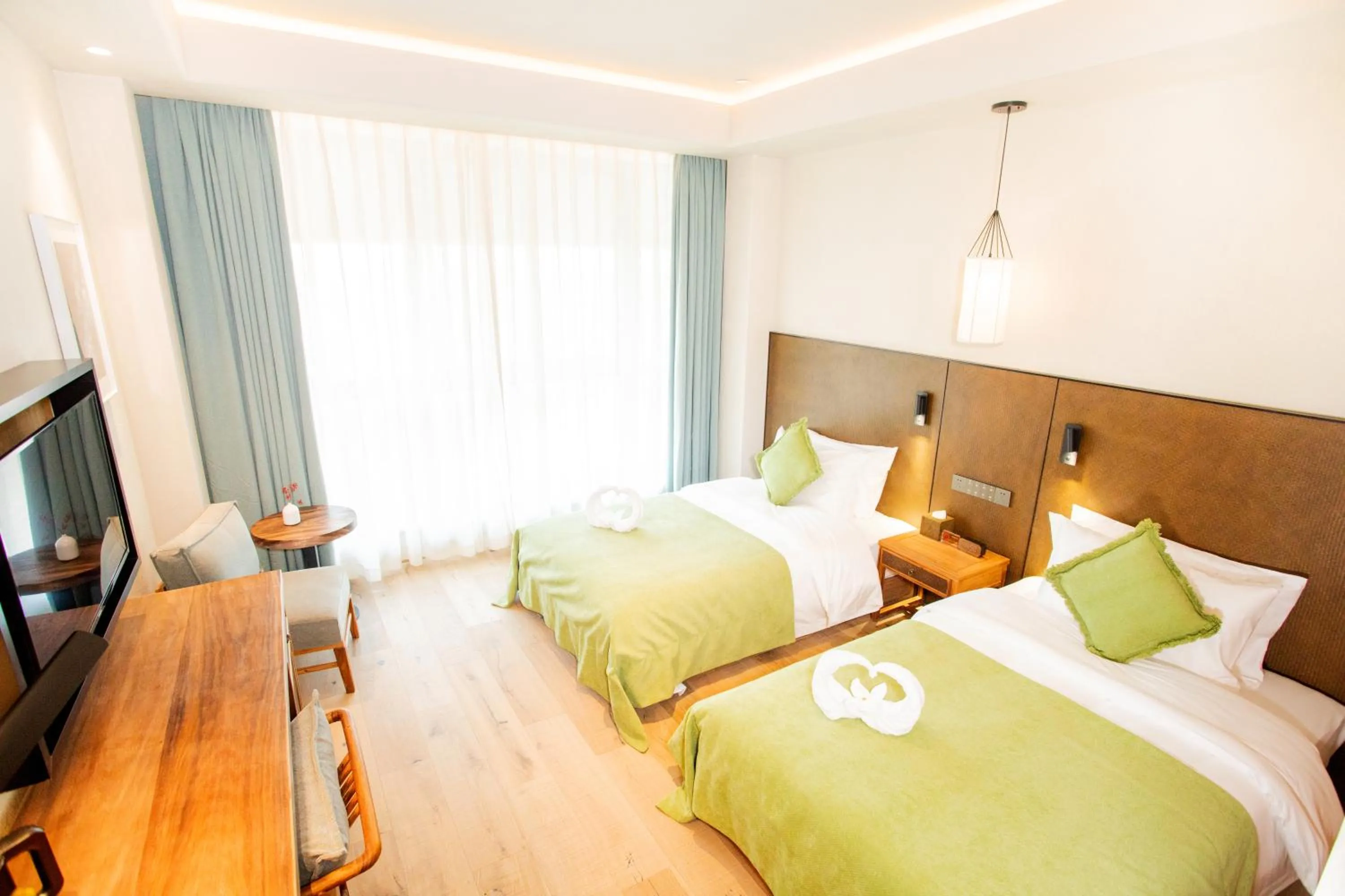 Bed in Jinling Onejoy Hotel