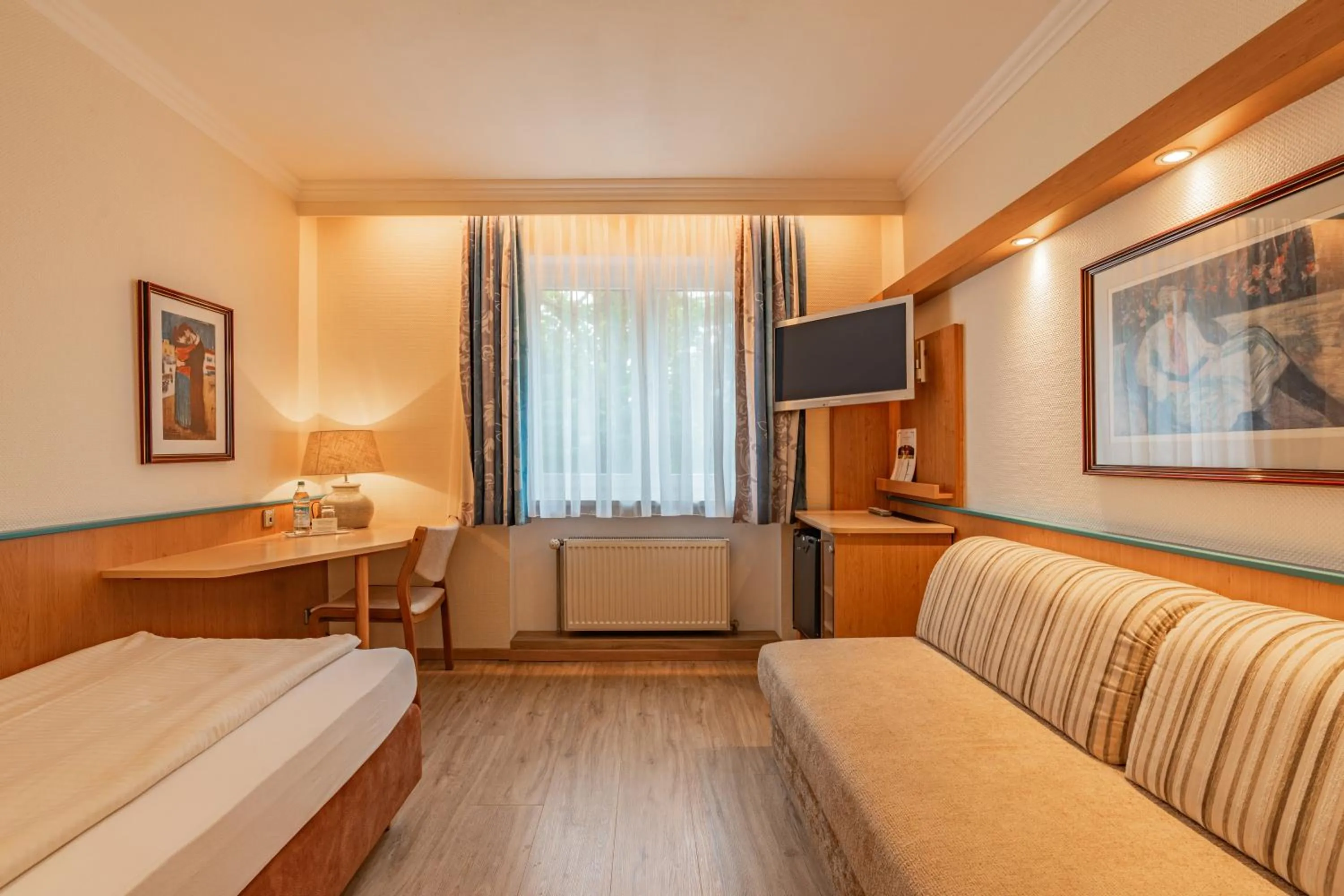 Bed in Parkhotel Crombach