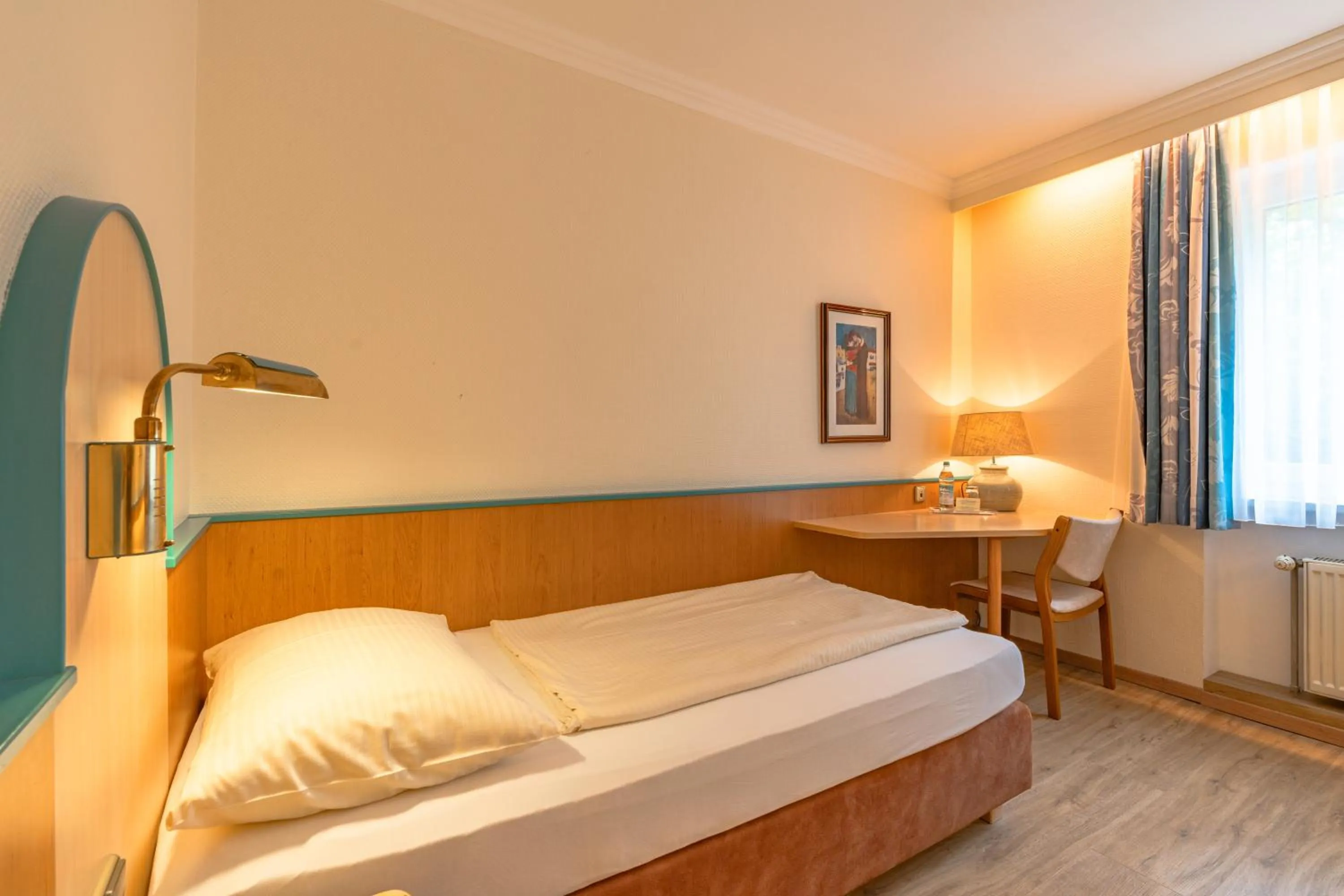 Bed in Parkhotel Crombach