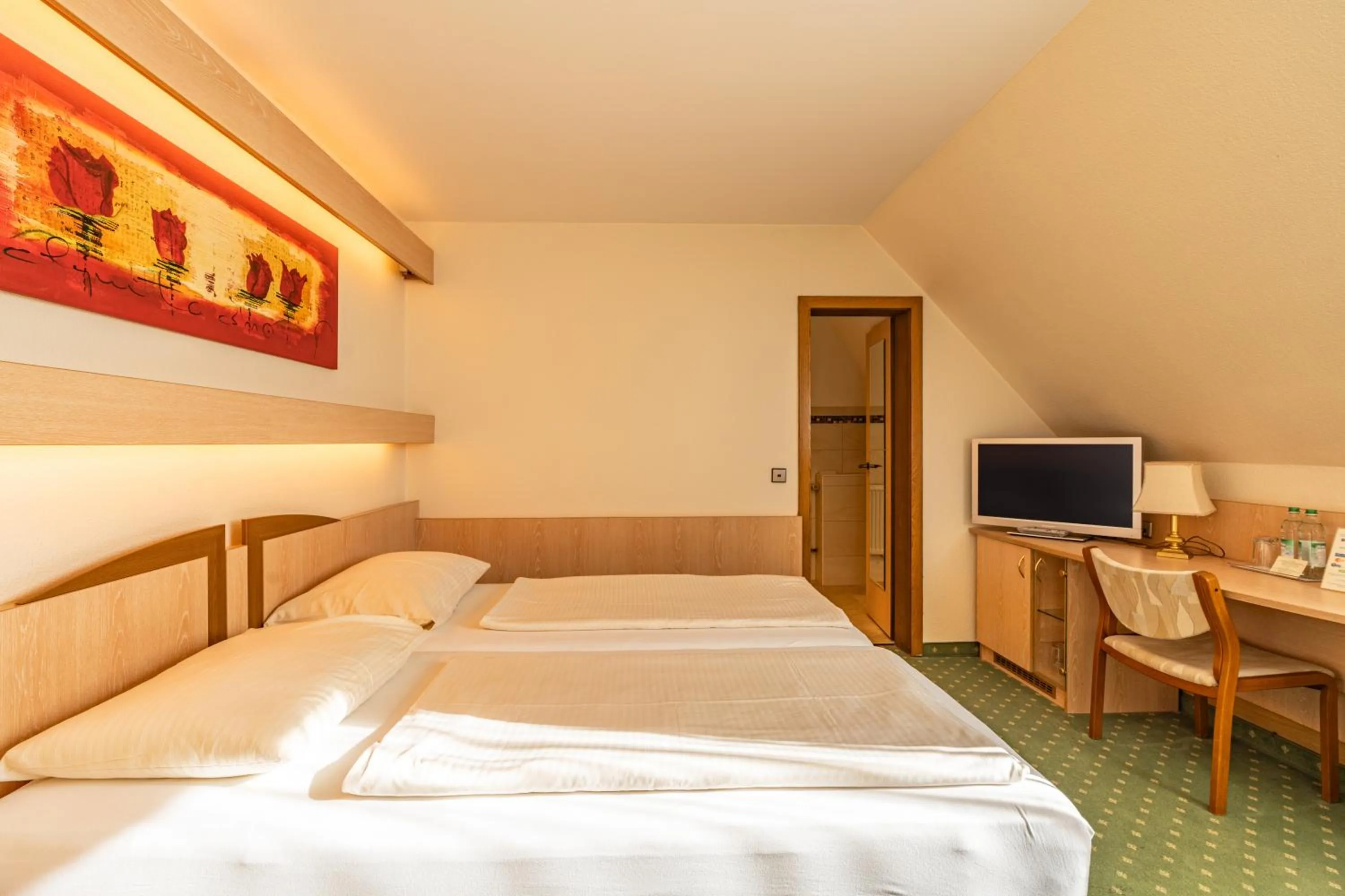 Bed in Parkhotel Crombach