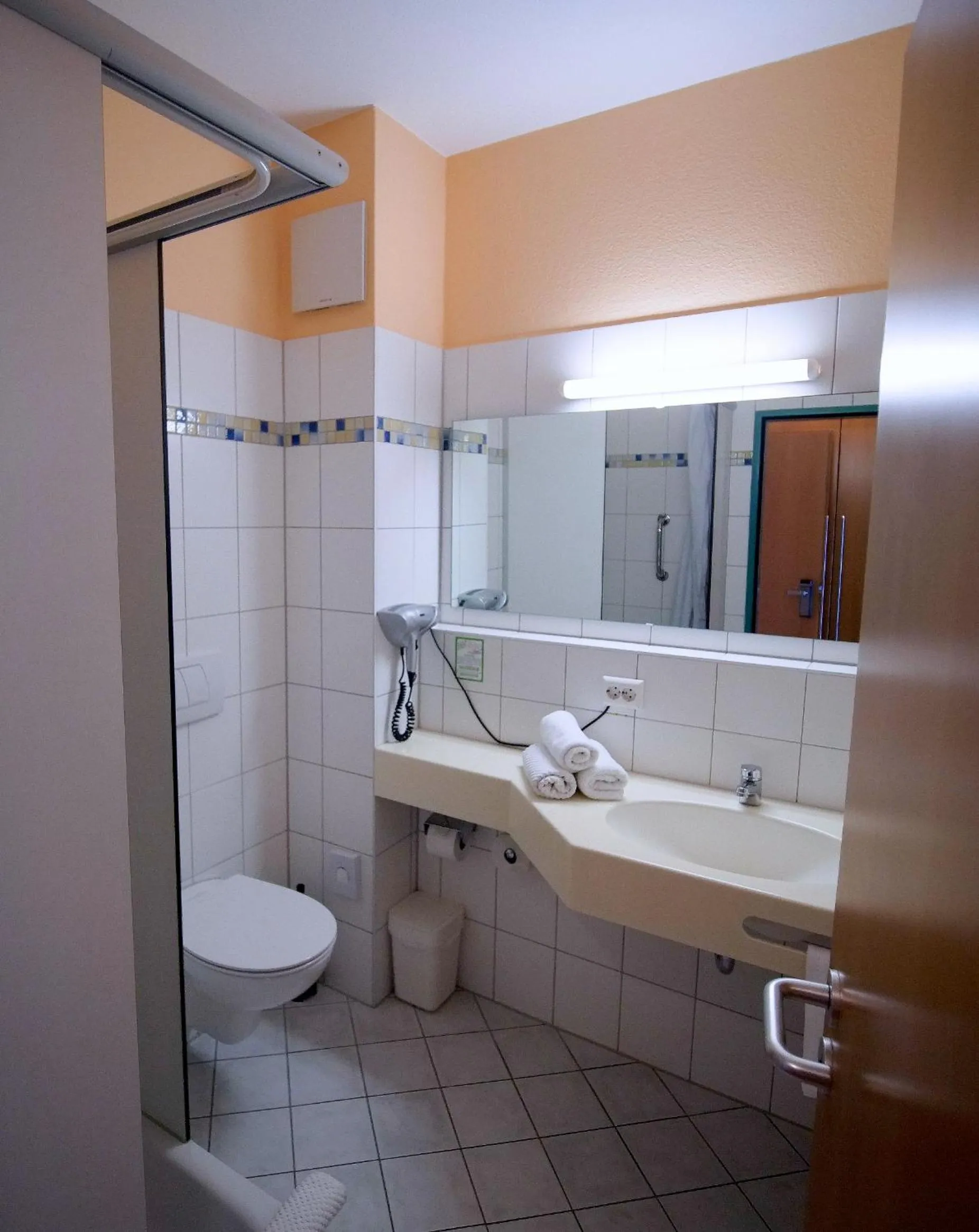 Bathroom in Hotel SunParc - SHUTTLE zum Europa-Park Rust 4km & Rulantica 2km