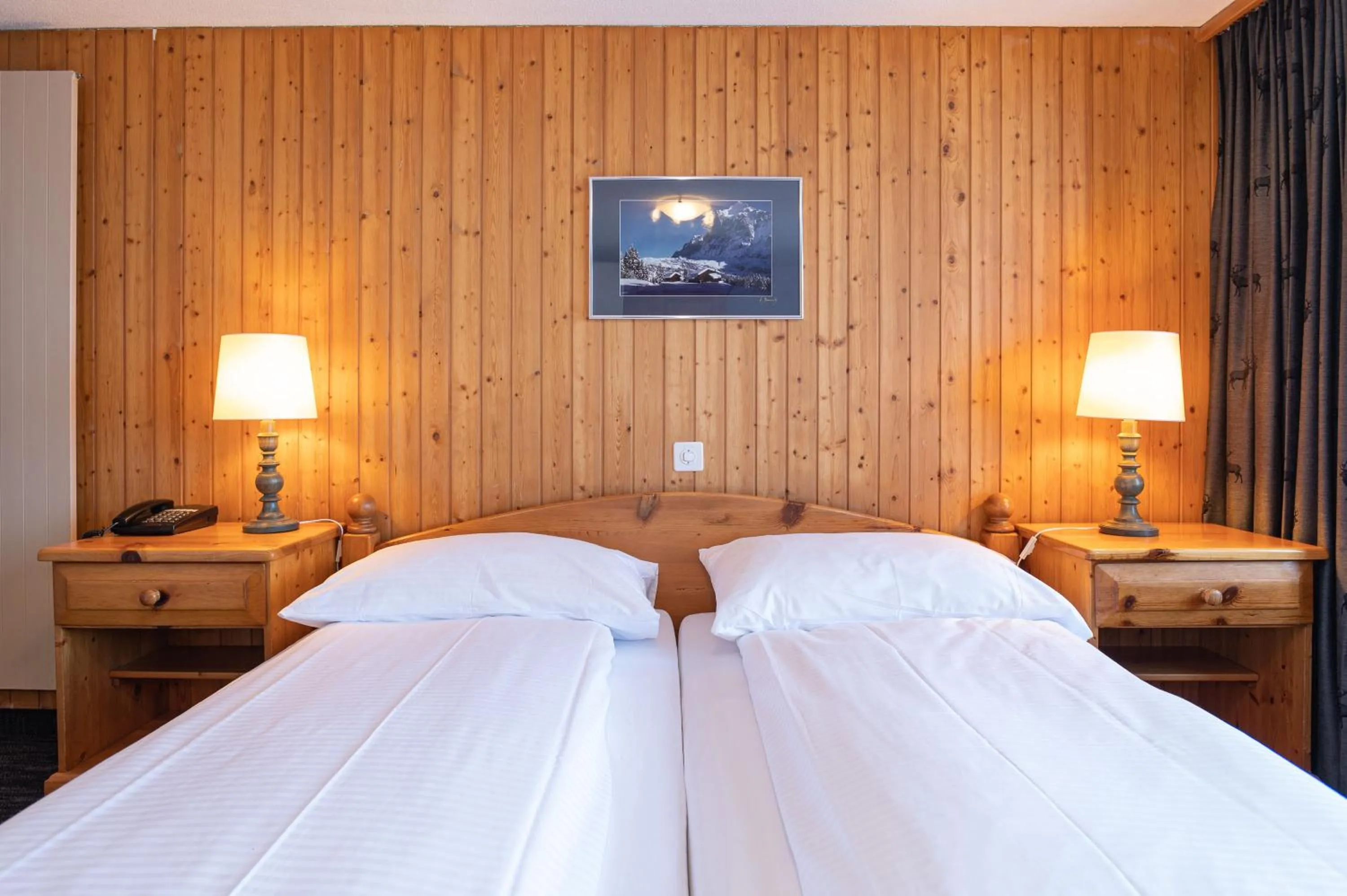 Bedroom, Bed in Jungfrau Lodge, Swiss Mountain Hotel