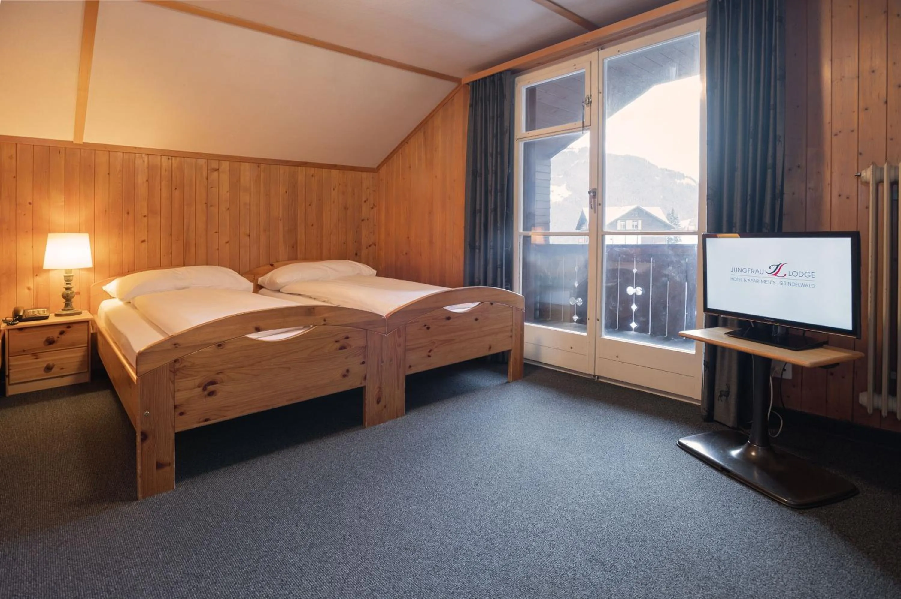 Bedroom, Bed in Jungfrau Lodge, Swiss Mountain Hotel
