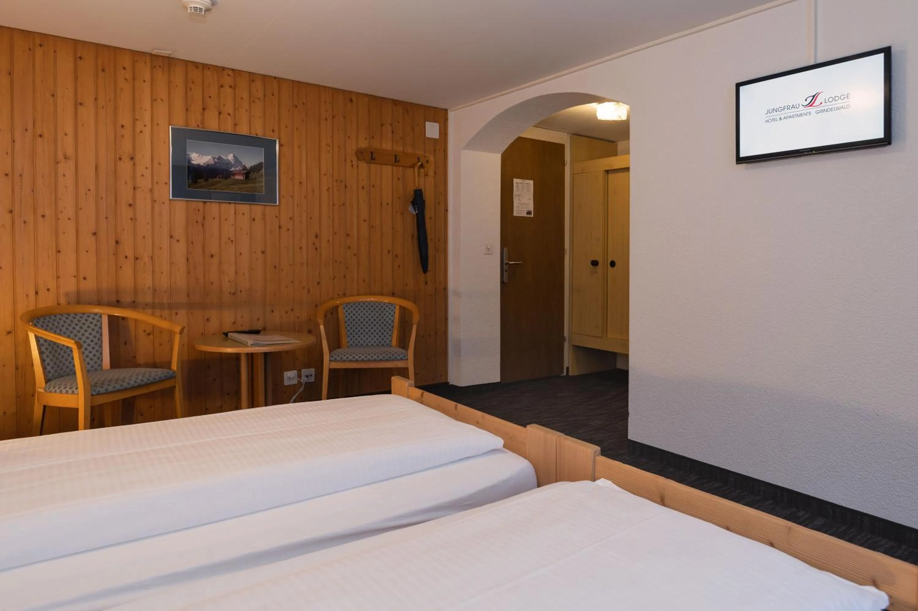 Bedroom, Bed in Jungfrau Lodge, Swiss Mountain Hotel