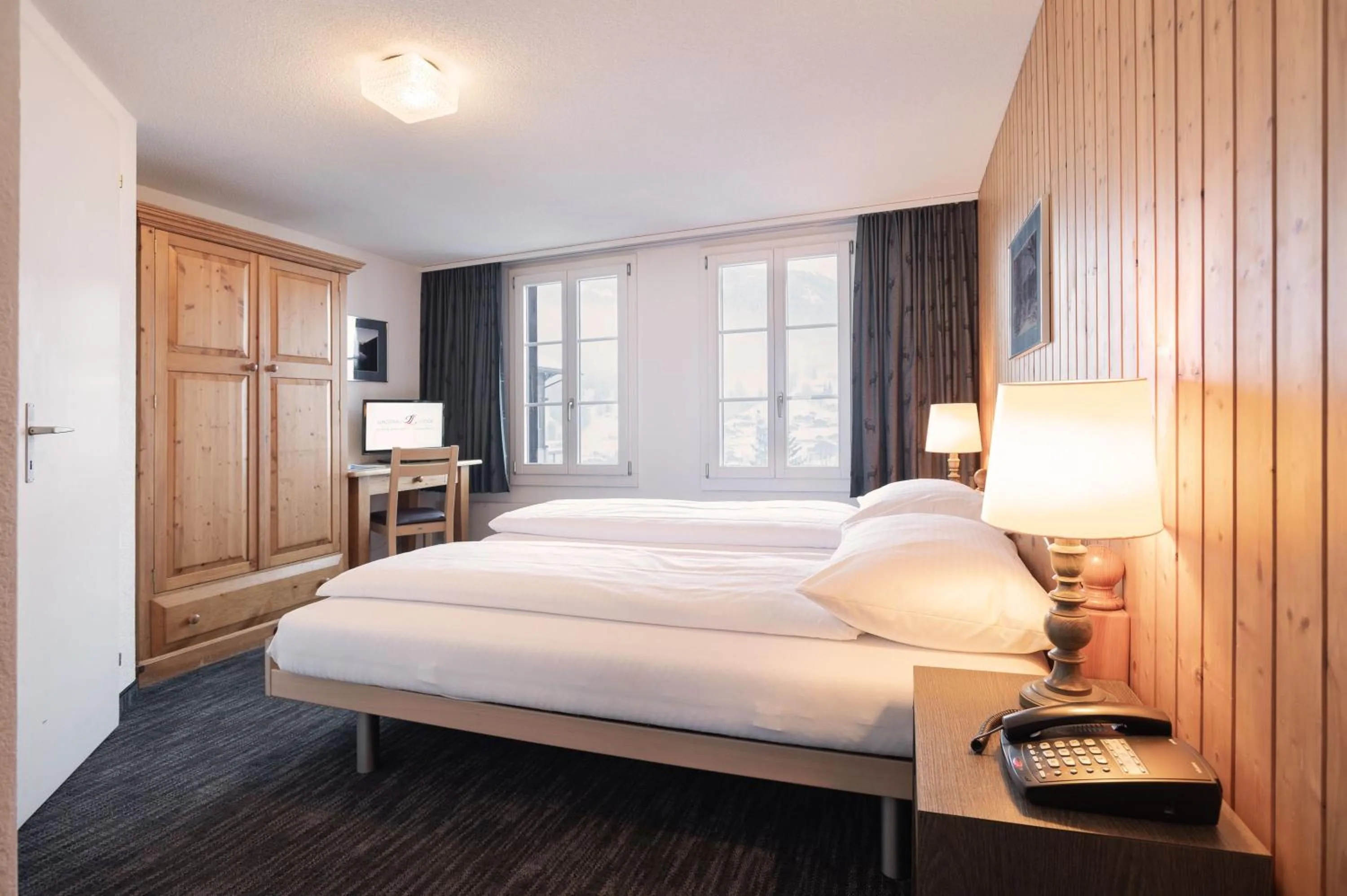 Bedroom, Bed in Jungfrau Lodge, Swiss Mountain Hotel