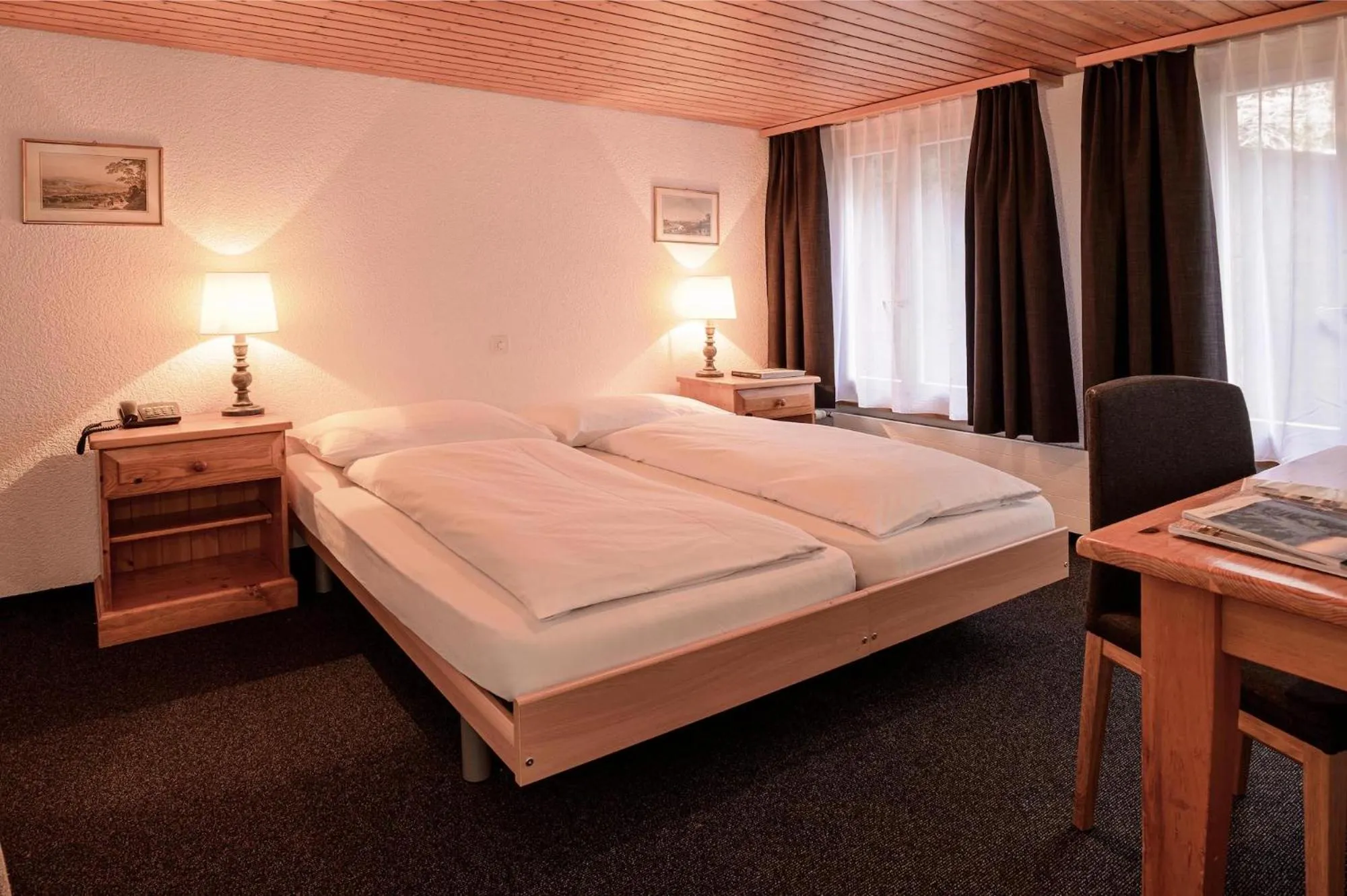 Photo of the whole room, Bed in Jungfrau Lodge, Swiss Mountain Hotel