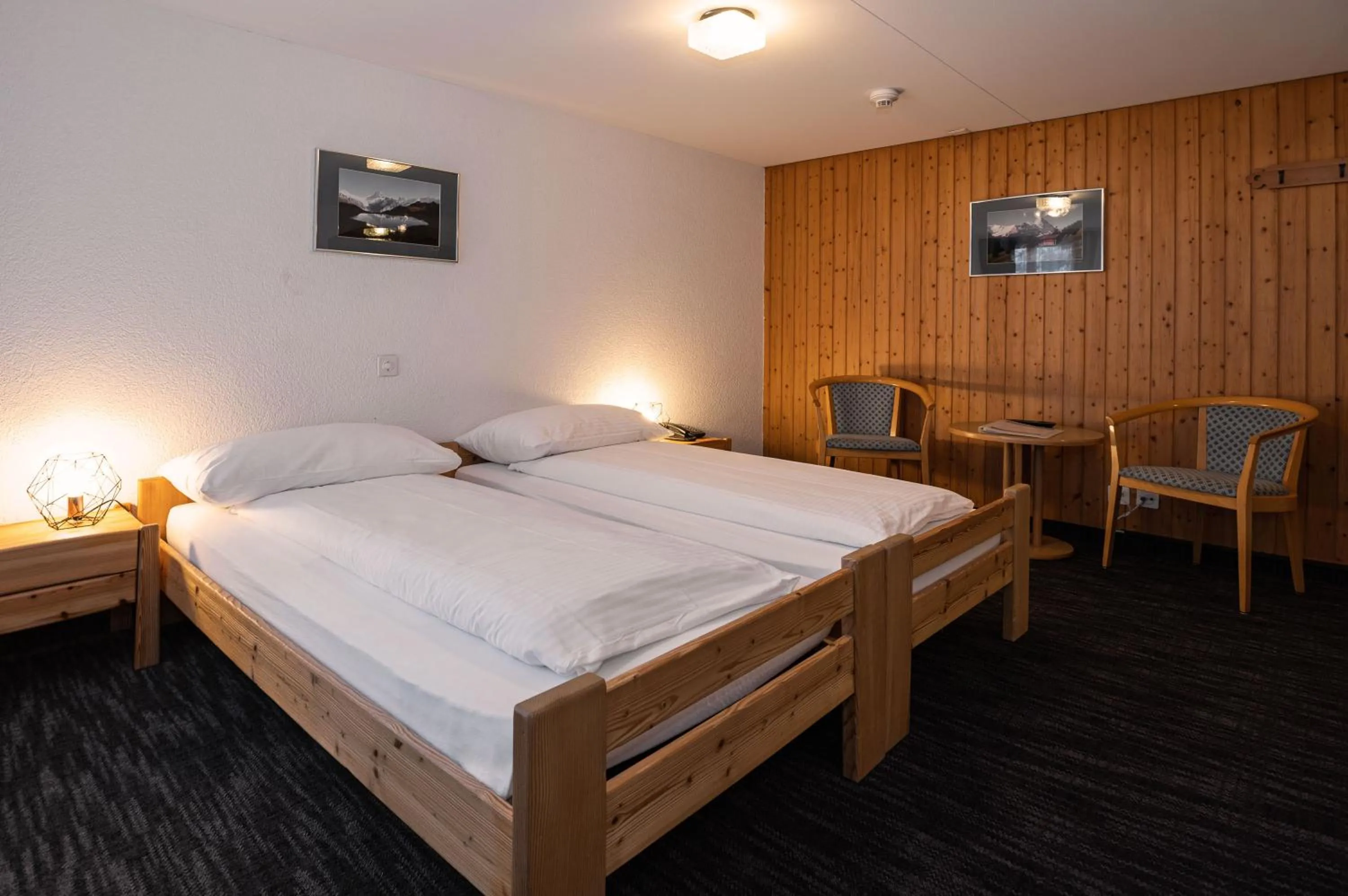 Bedroom, Bed in Jungfrau Lodge, Swiss Mountain Hotel