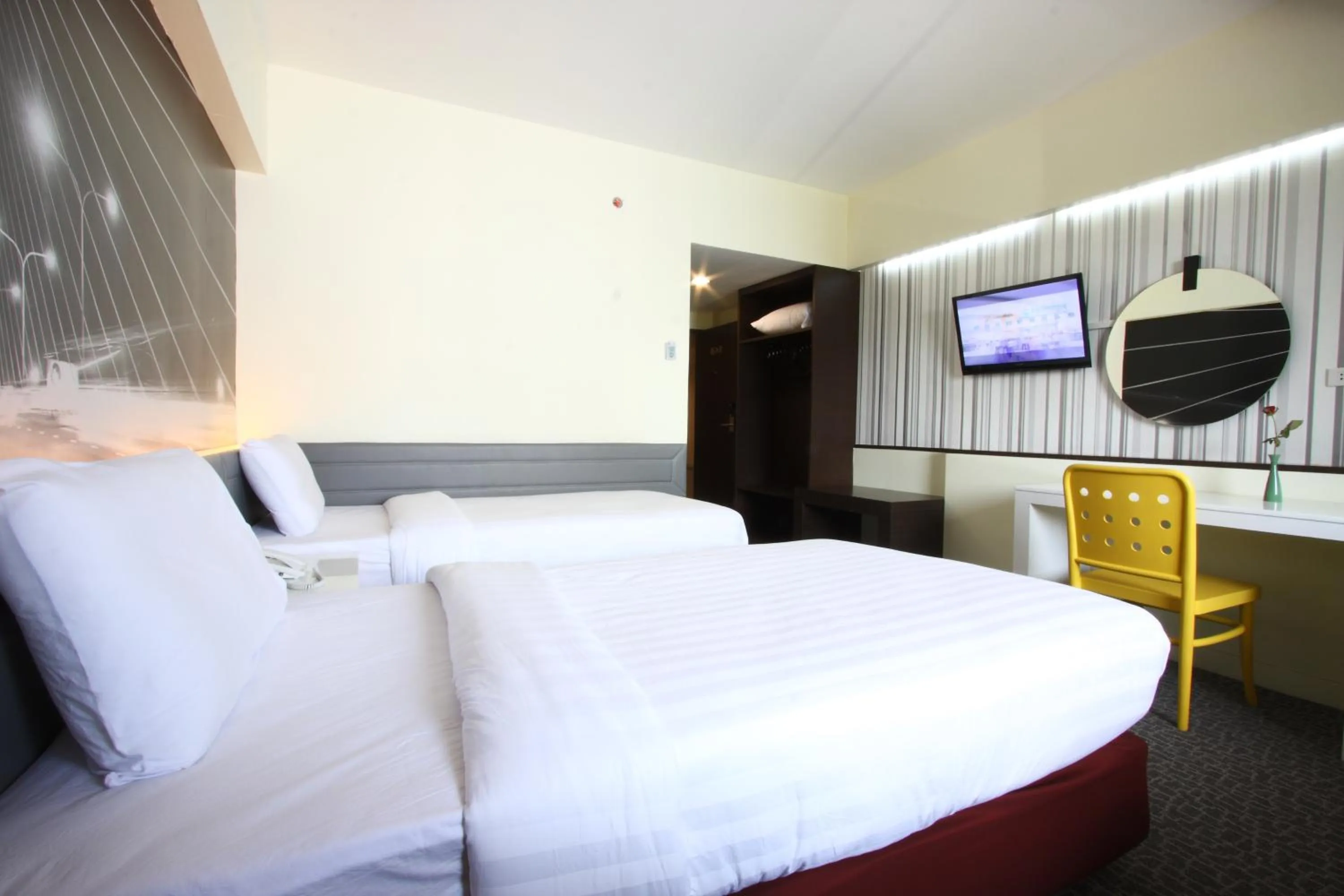 Bed in Royal Delight Hotel