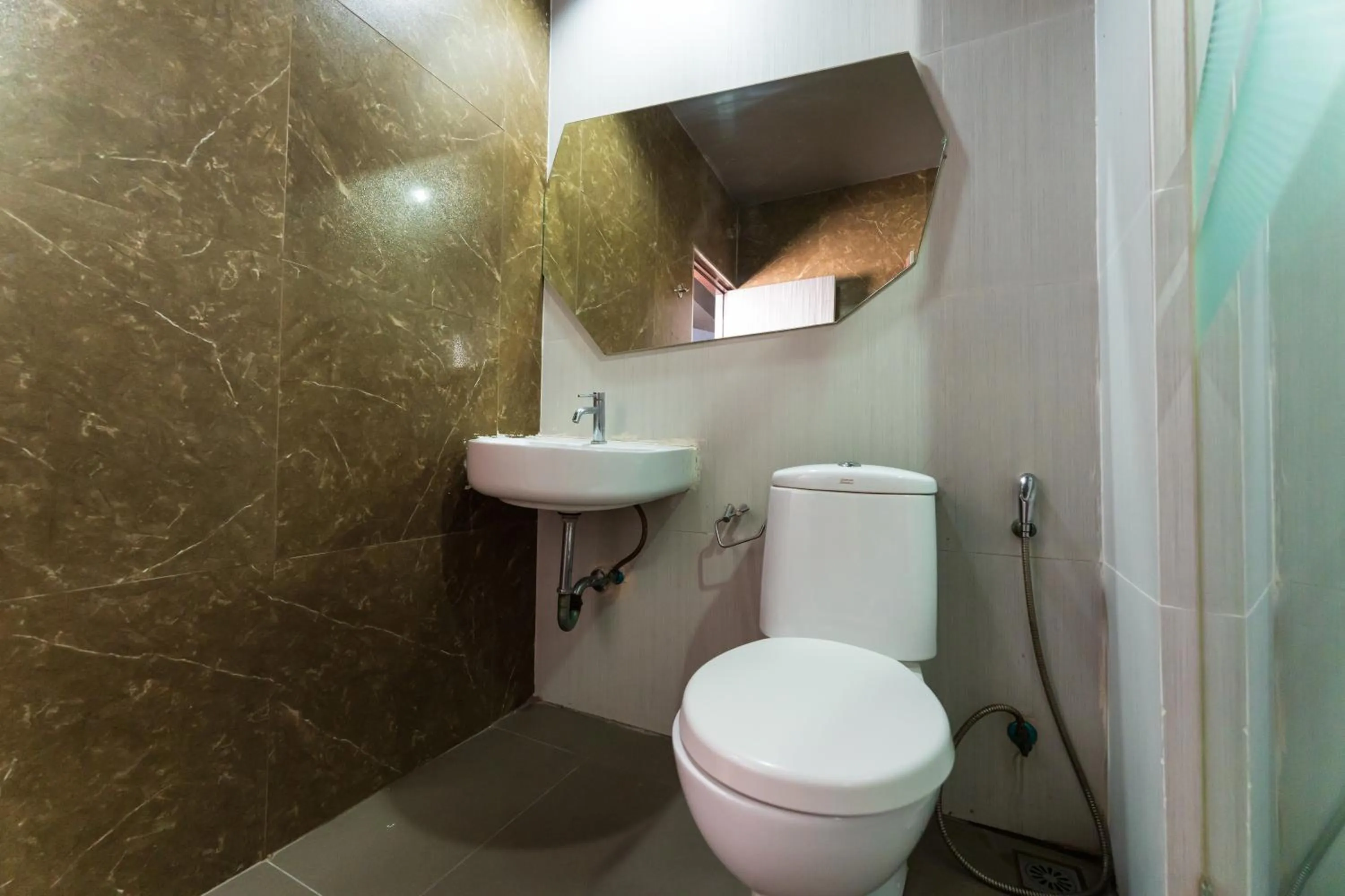 Toilet in Royal Delight Hotel