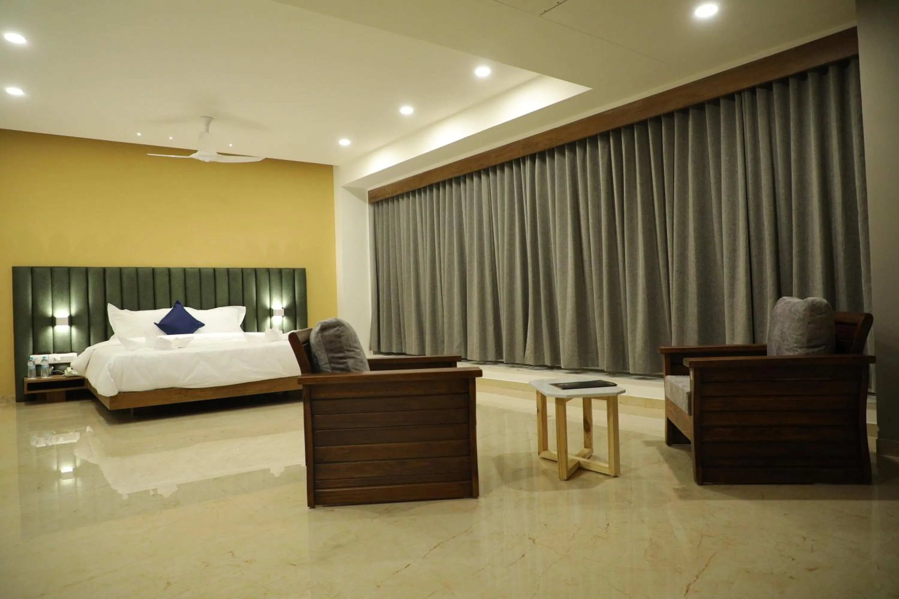 Photo of the whole room, Bed in VITS The Somnath Gateway