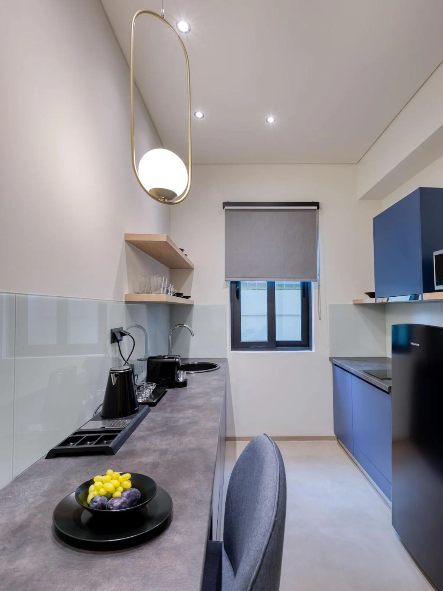 Kitchen or kitchenette in Muse Urban Suites
