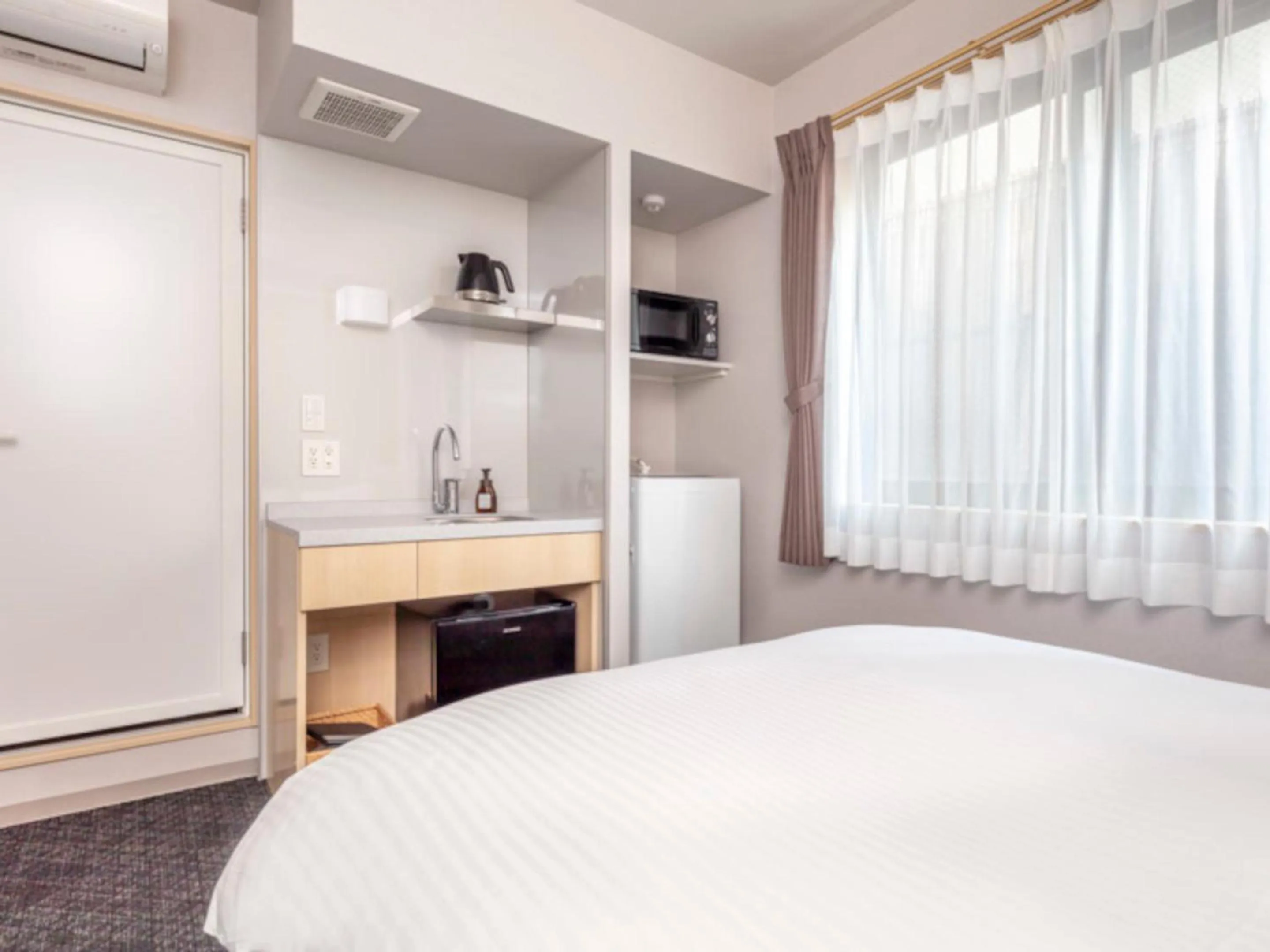 Kitchen or kitchenette, Bed in Hotel GOCO stay Kyoto Shijo Kawaramachi
