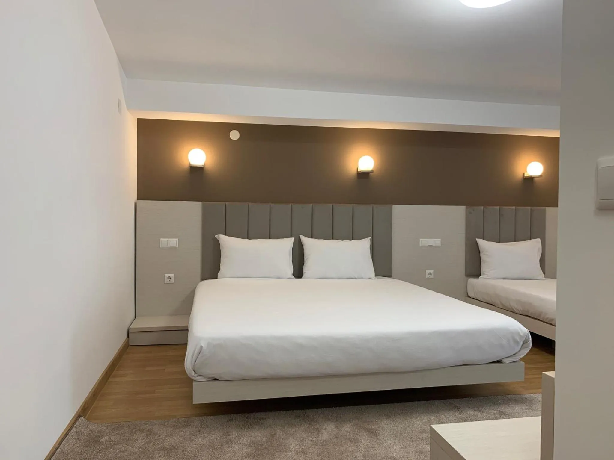 Bed in Royal L Hotel