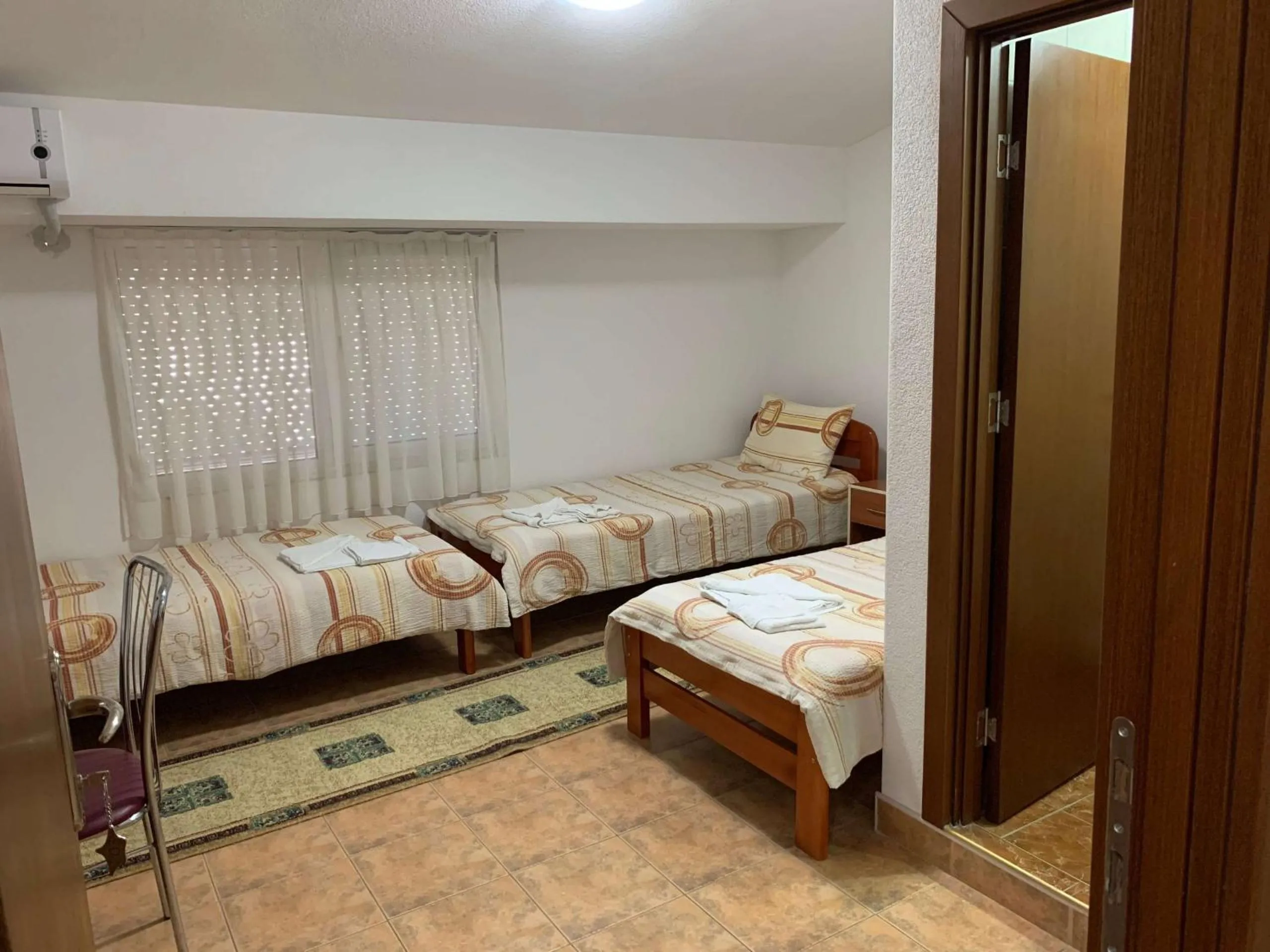 Bed in Royal L Hotel