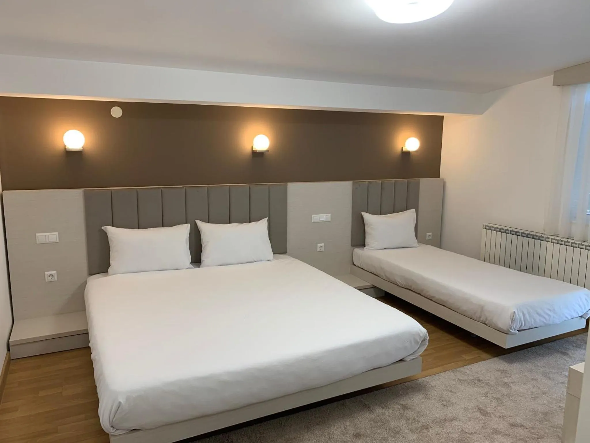 Bed in Royal L Hotel