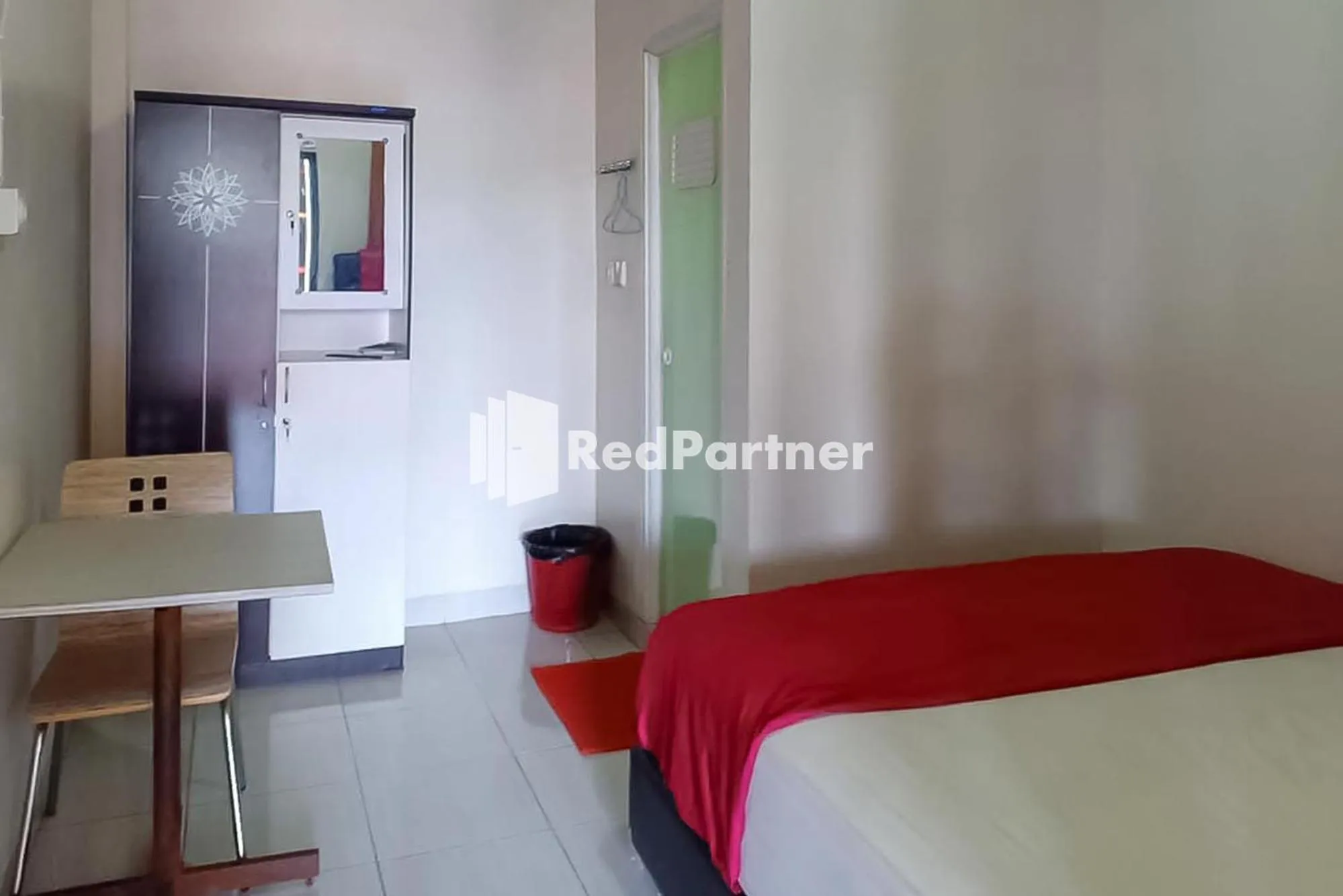 Bed in Hotel Dheadita Syariah Sungai Penuh Mitra RedDoorz