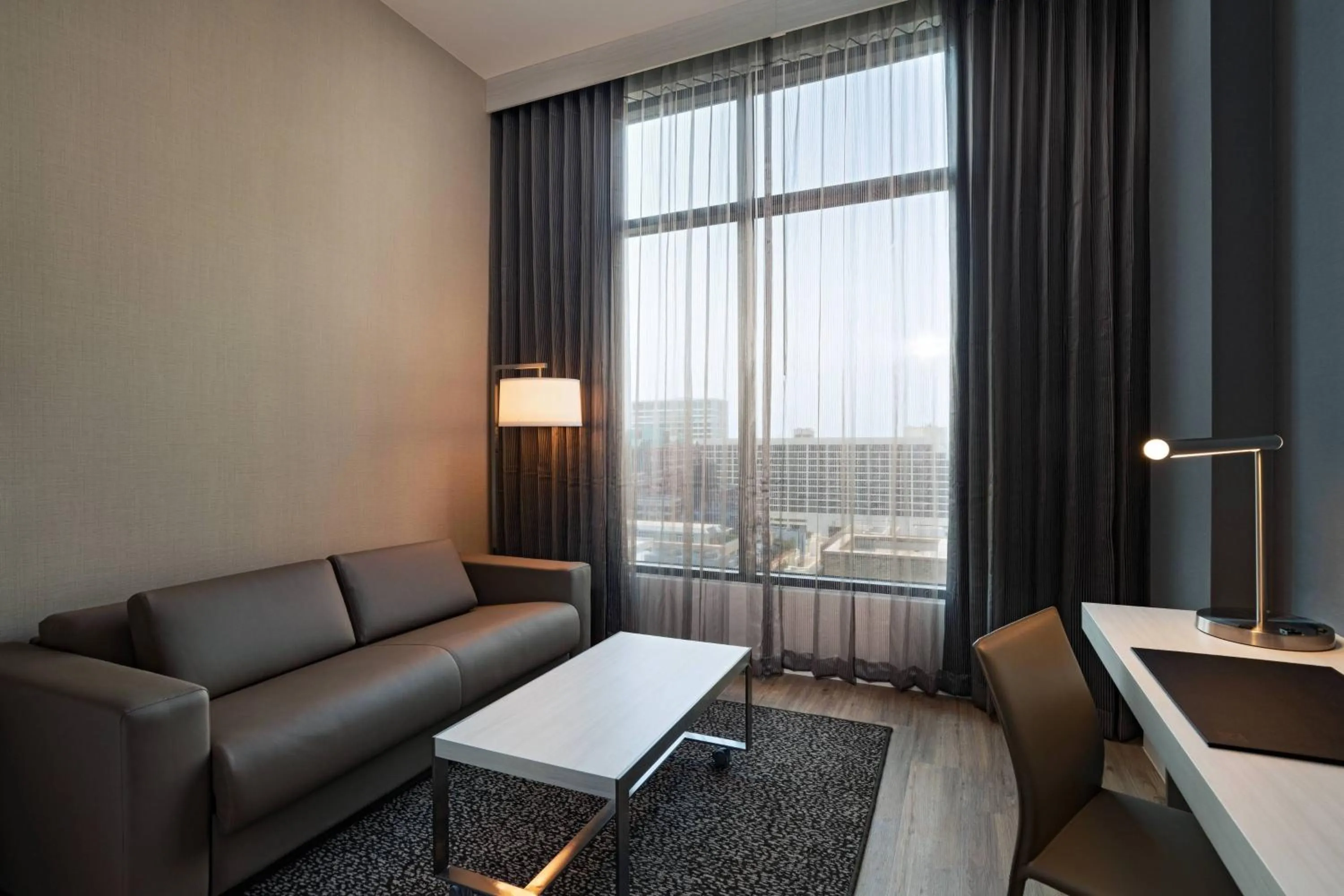 Living room in AC Hotel by Marriott Fort Worth Downtown