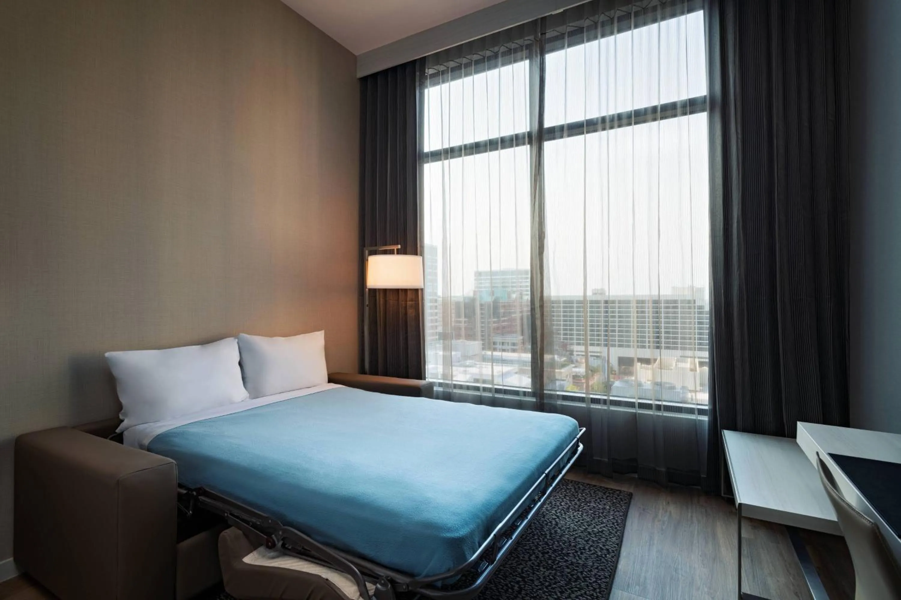 Photo of the whole room, Bed in AC Hotel by Marriott Fort Worth Downtown