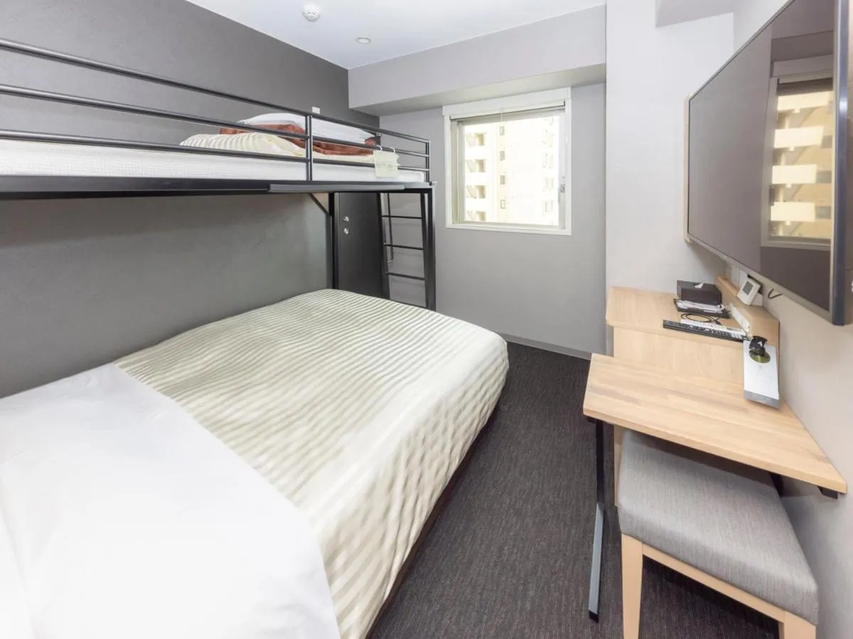 Bed in Super Hotel Sapporo Kitagojo Dori