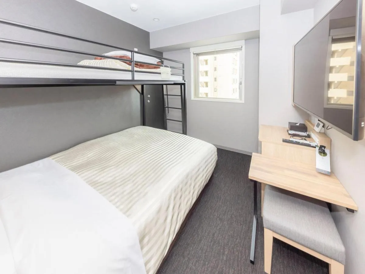 Bed in Super Hotel Sapporo Kitagojo Dori