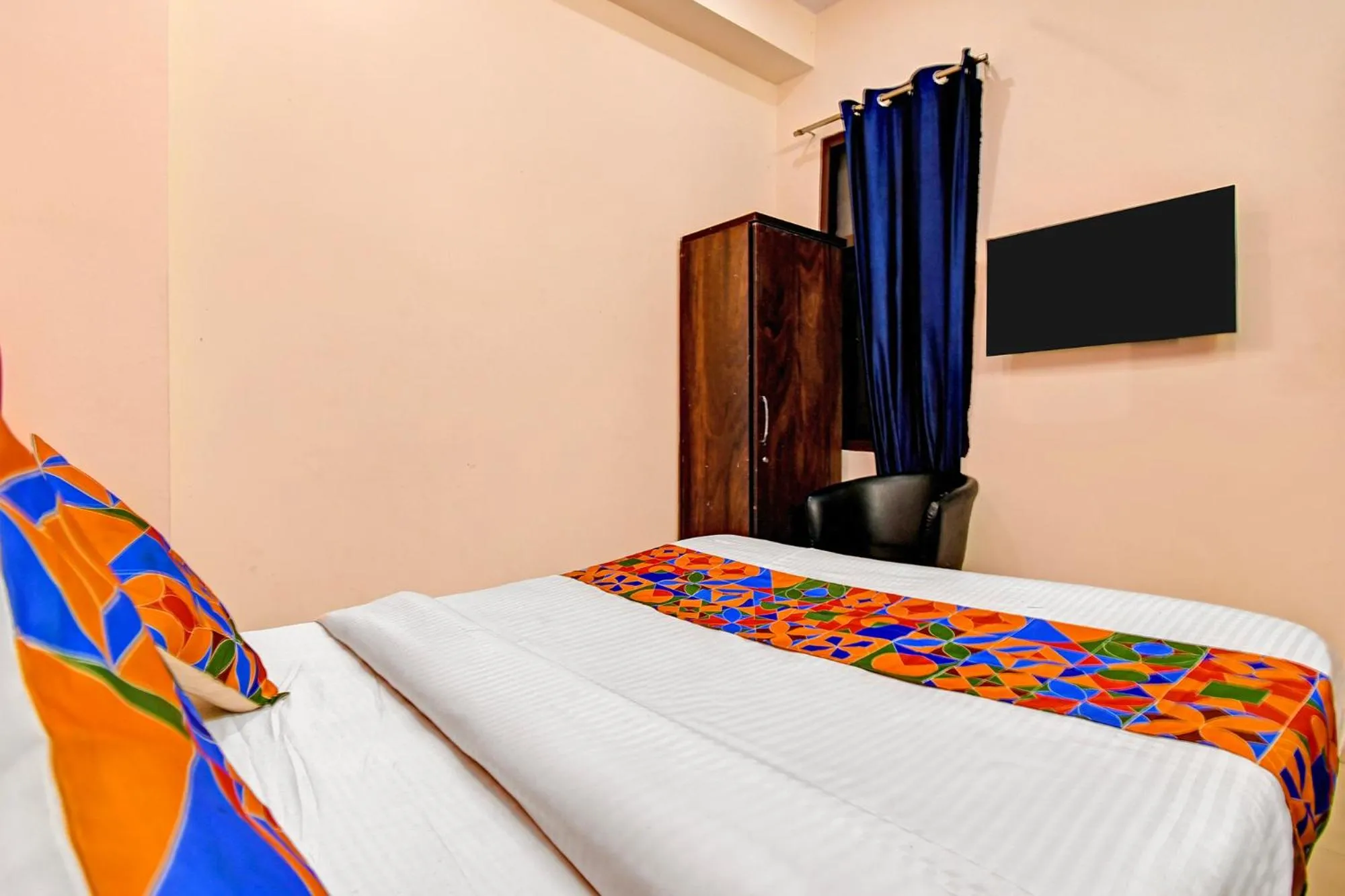 Bed in FabHotel Insight Inn