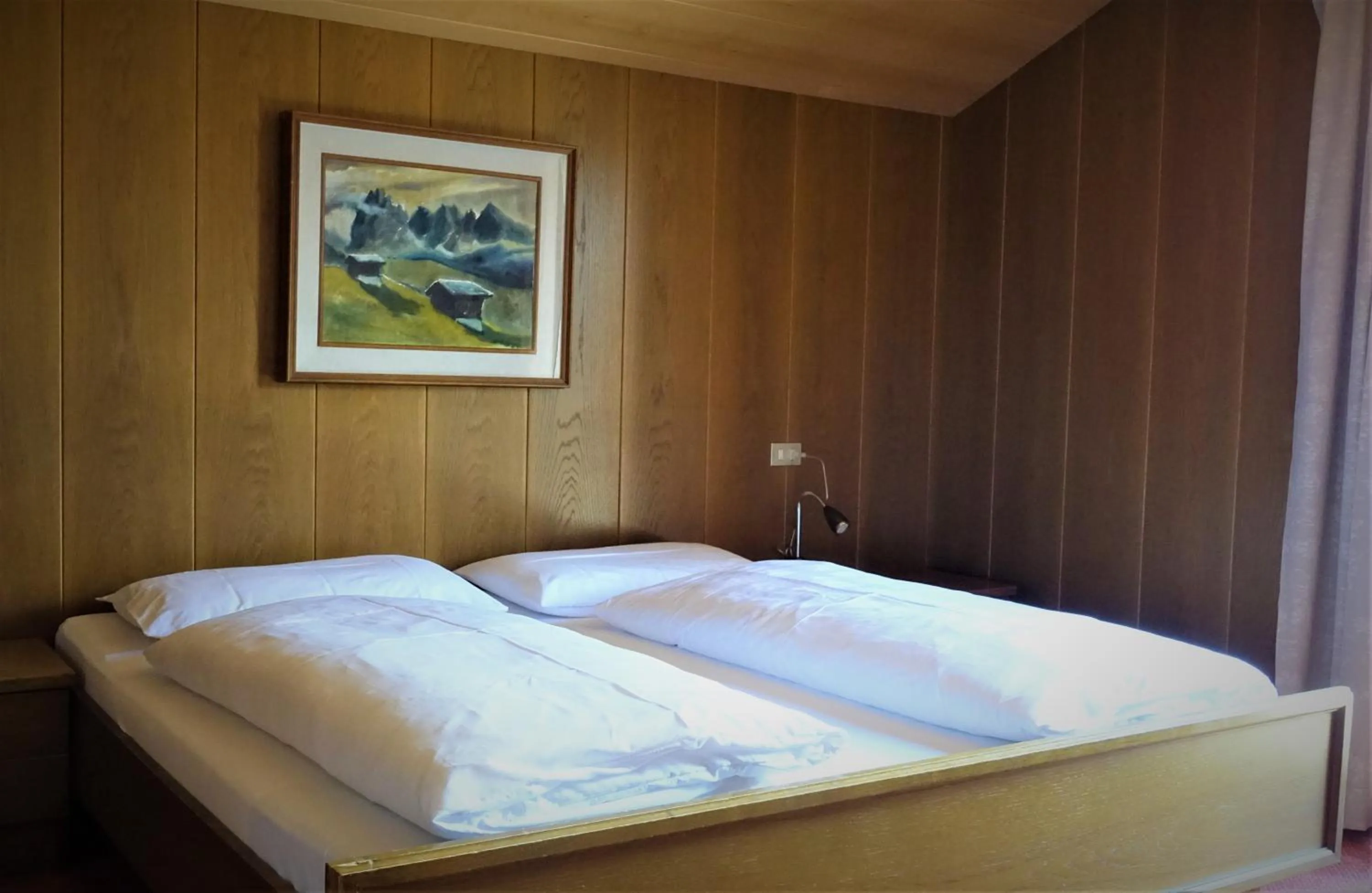 Photo of the whole room, Bed in Pension Dolomieu