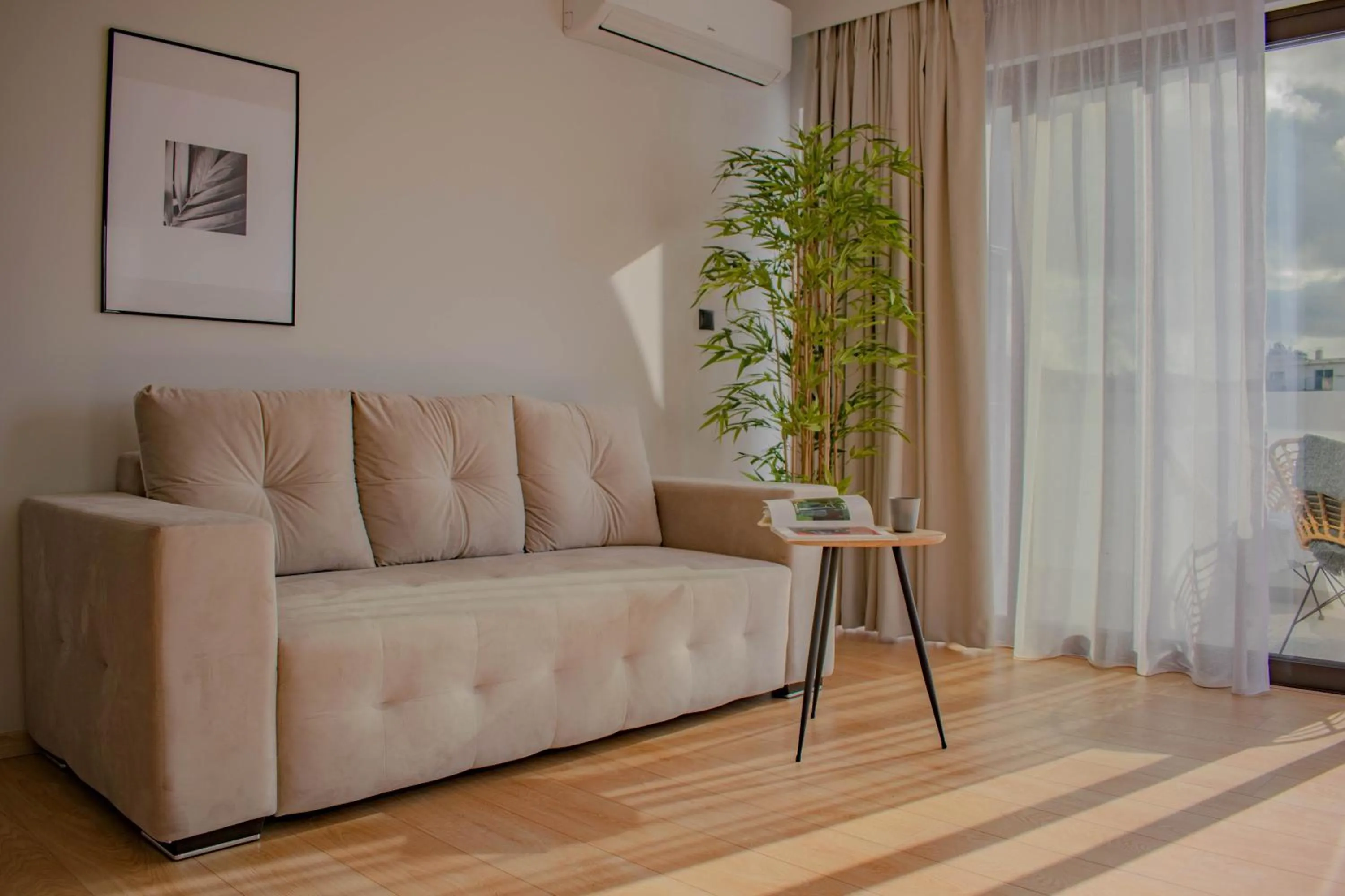 Living room in Filopappou Hill Suites by Athens Stay