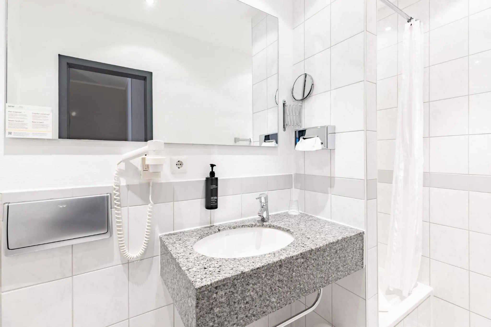 Bathroom in Garner Hotel Cologne Porz - Airport by IHG