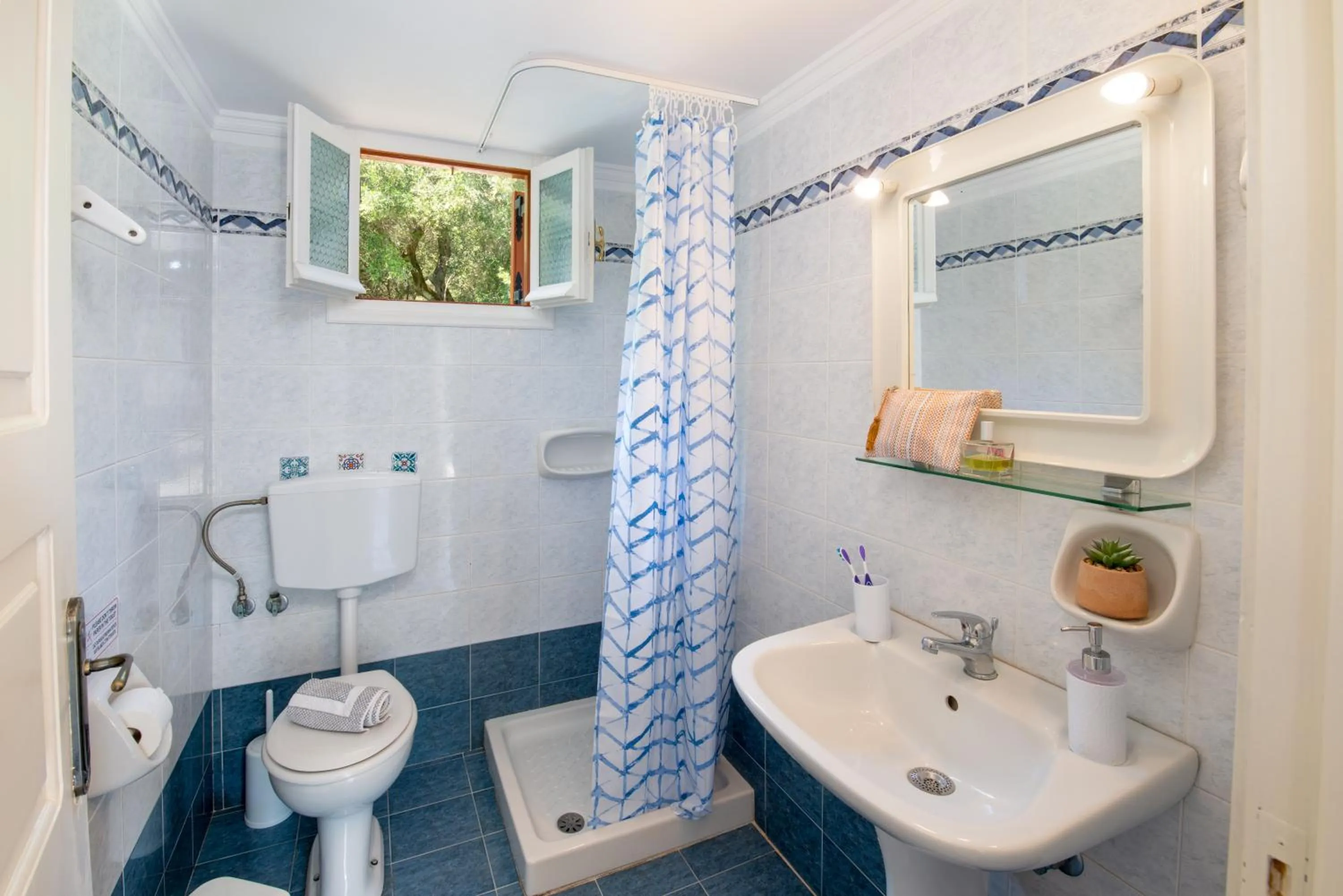 Bathroom in LIvadi Studios with Pool