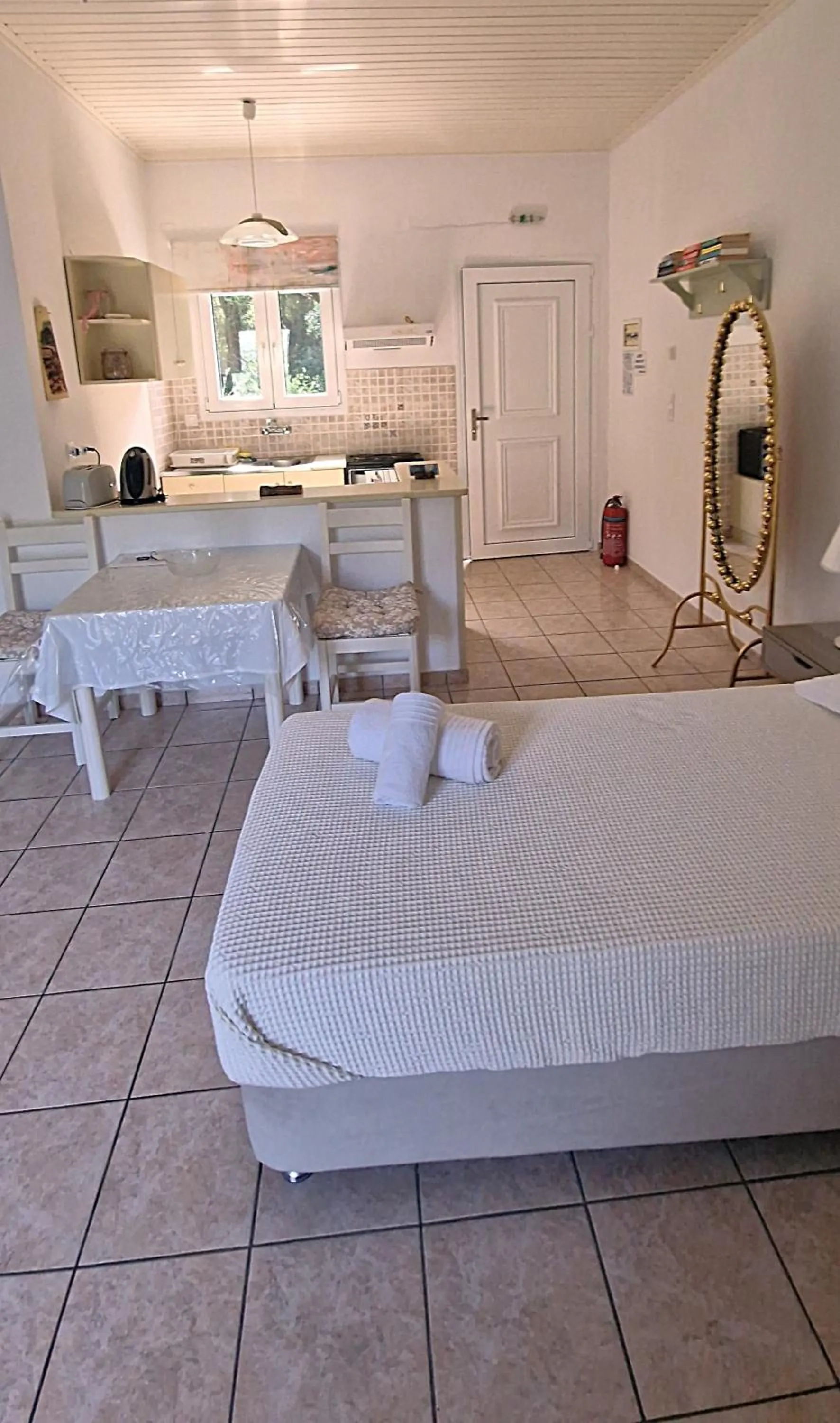 Dining area in LIvadi Studios with Pool