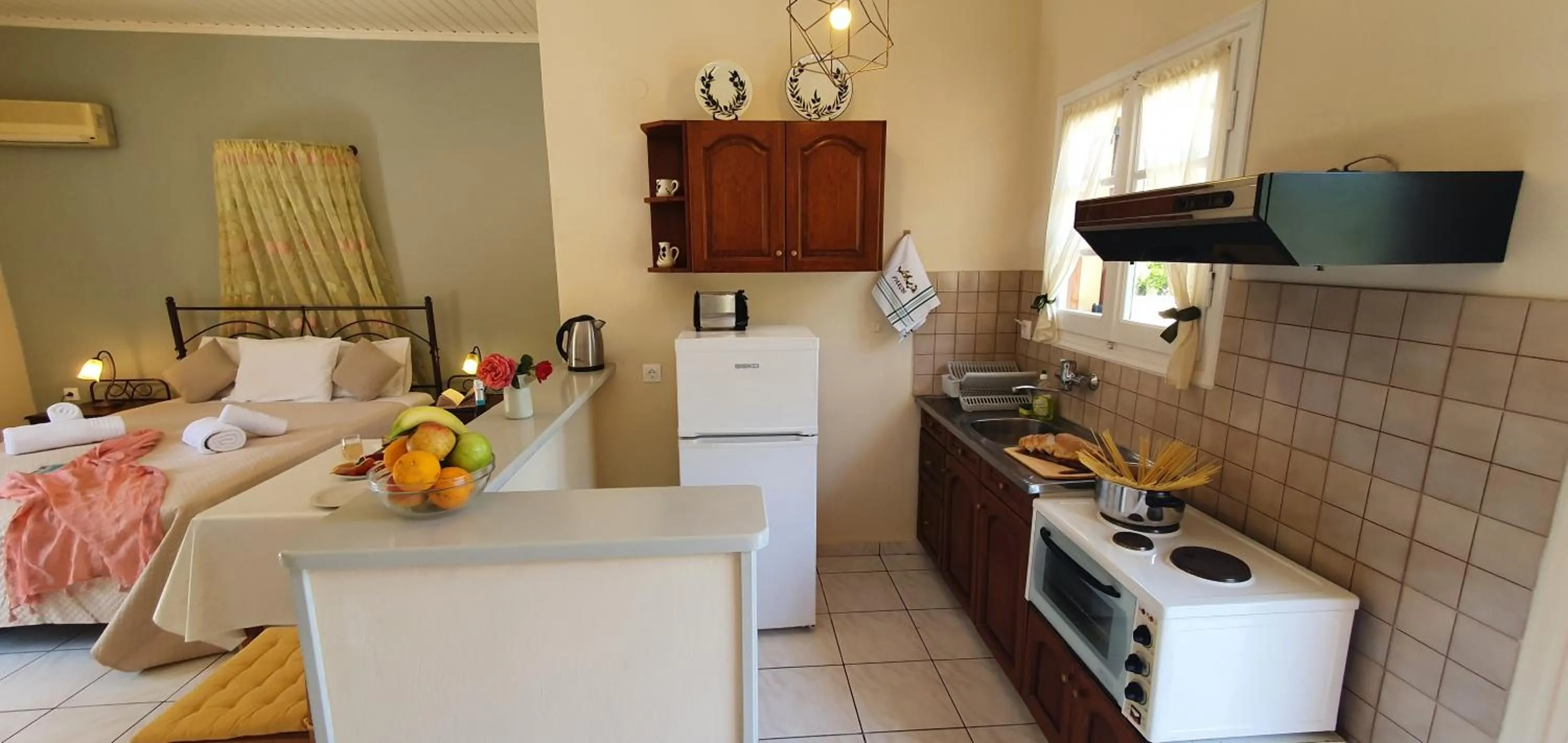 Bed in LIvadi Studios with Pool