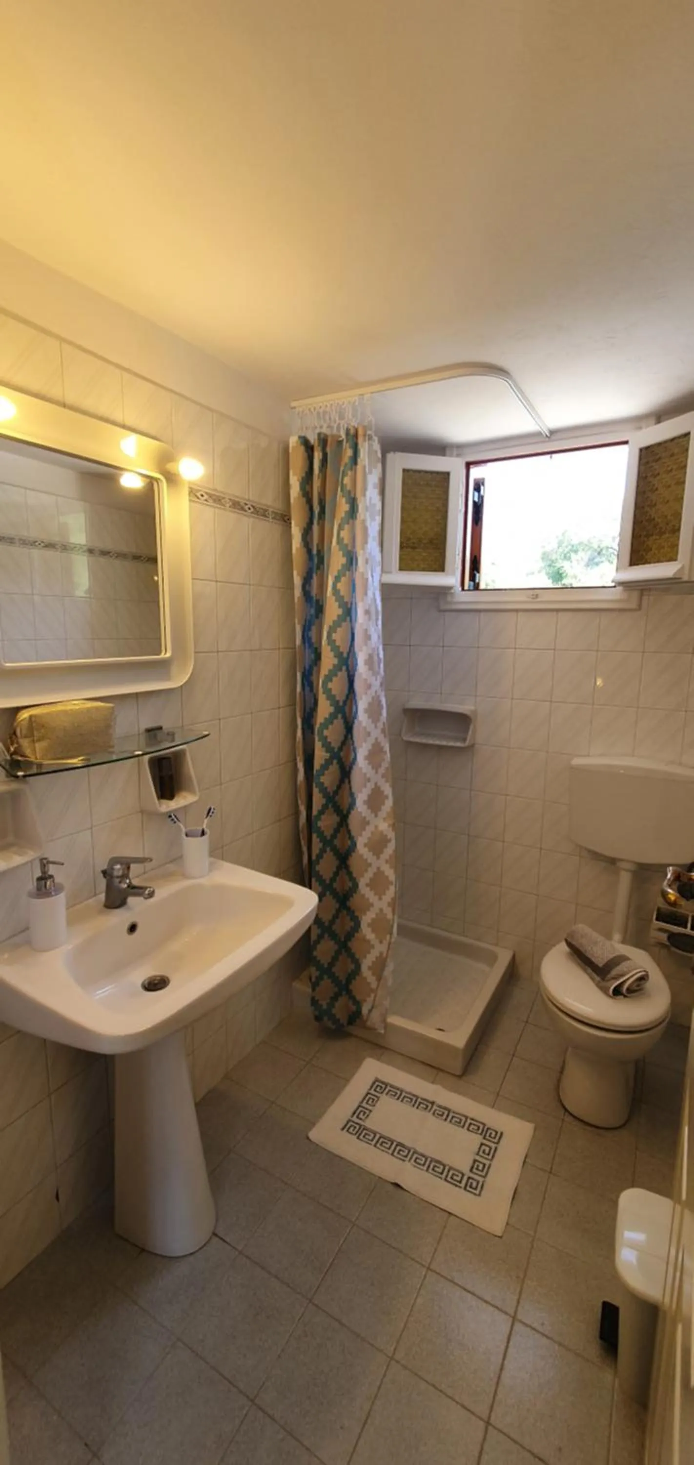 Bathroom in LIvadi Studios with Pool