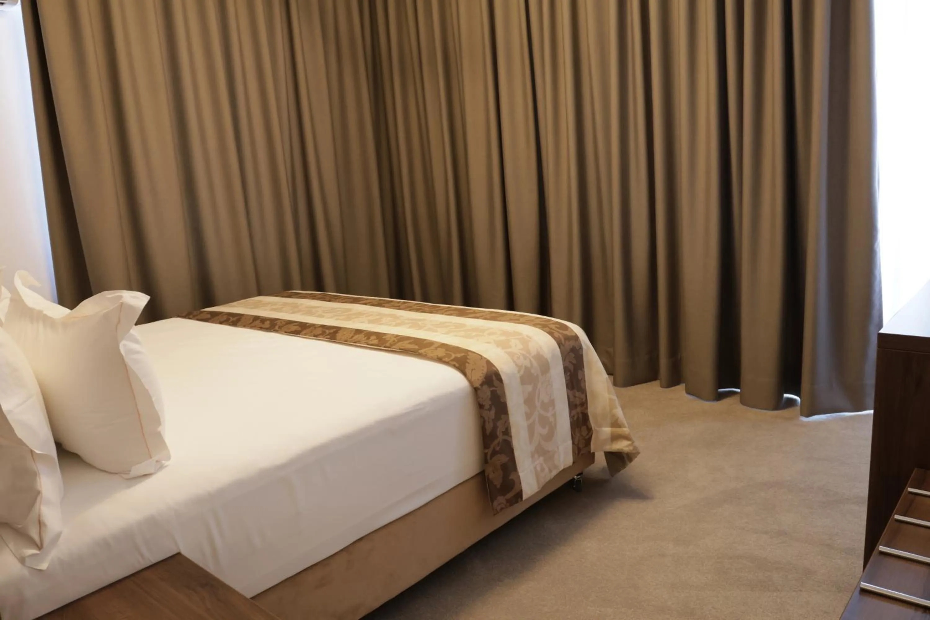 Bed in Hotel McPietroasa