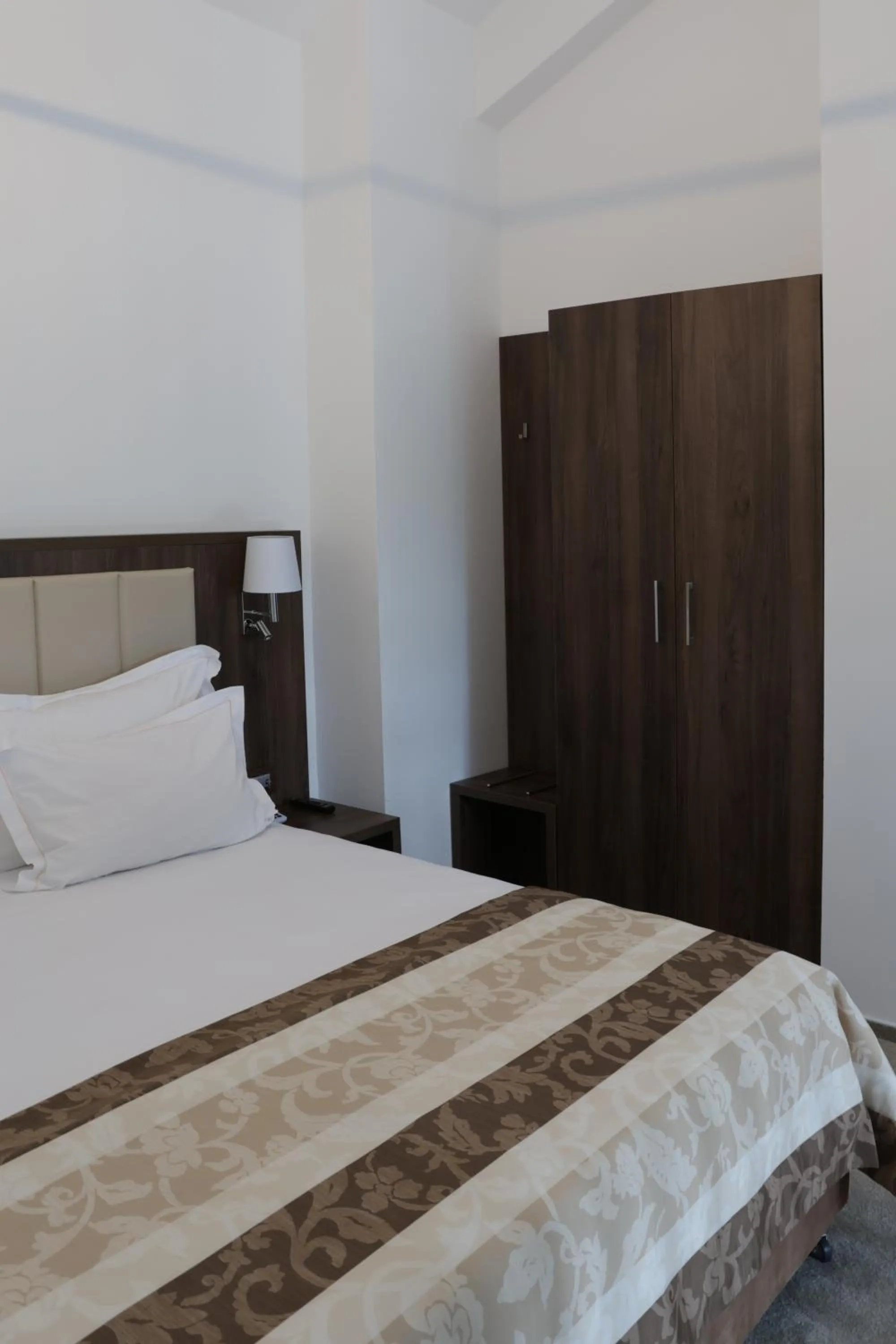 Bed in Hotel McPietroasa