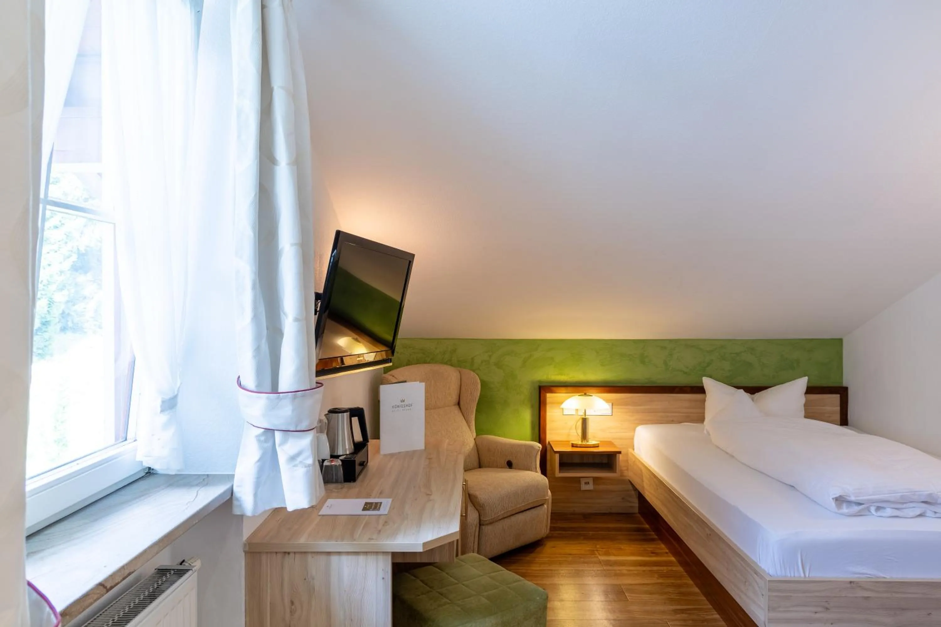 Photo of the whole room, Bed in Königshof Hotel Resort