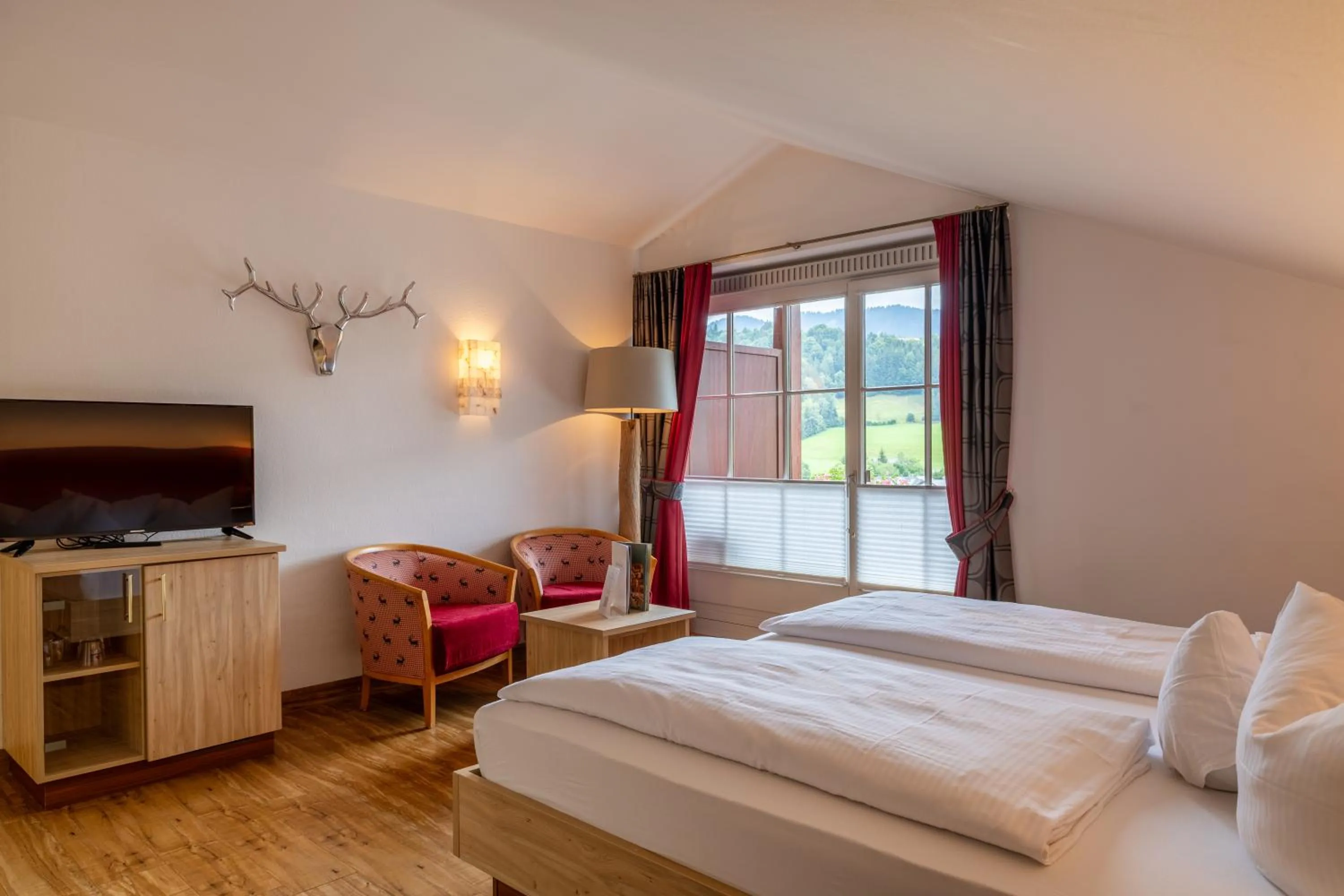Photo of the whole room, Bed in Königshof Hotel Resort