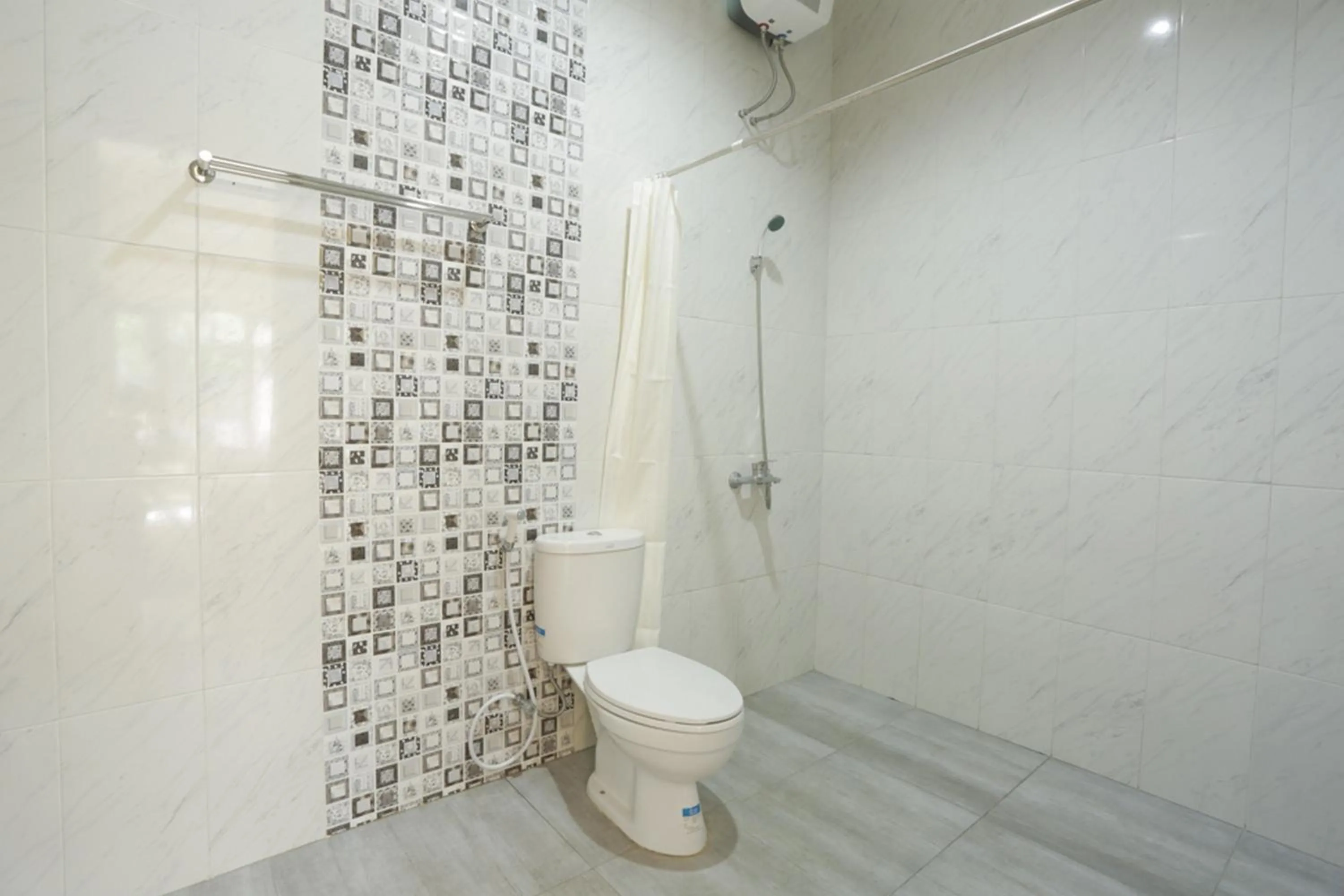 Bathroom in IDR Green Guest House Syariah Mitra RedDoorz