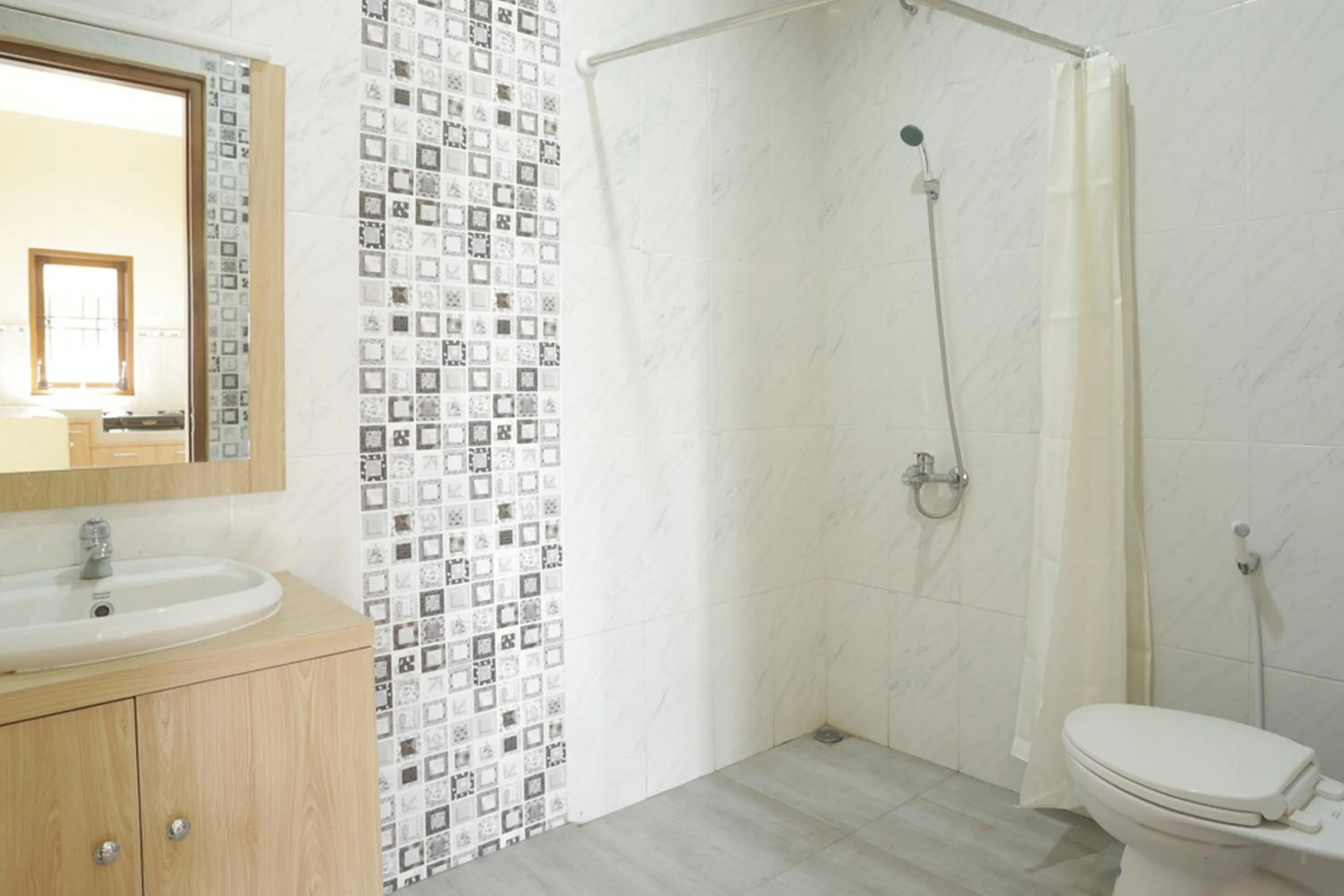 Bathroom in IDR Green Guest House Syariah Mitra RedDoorz