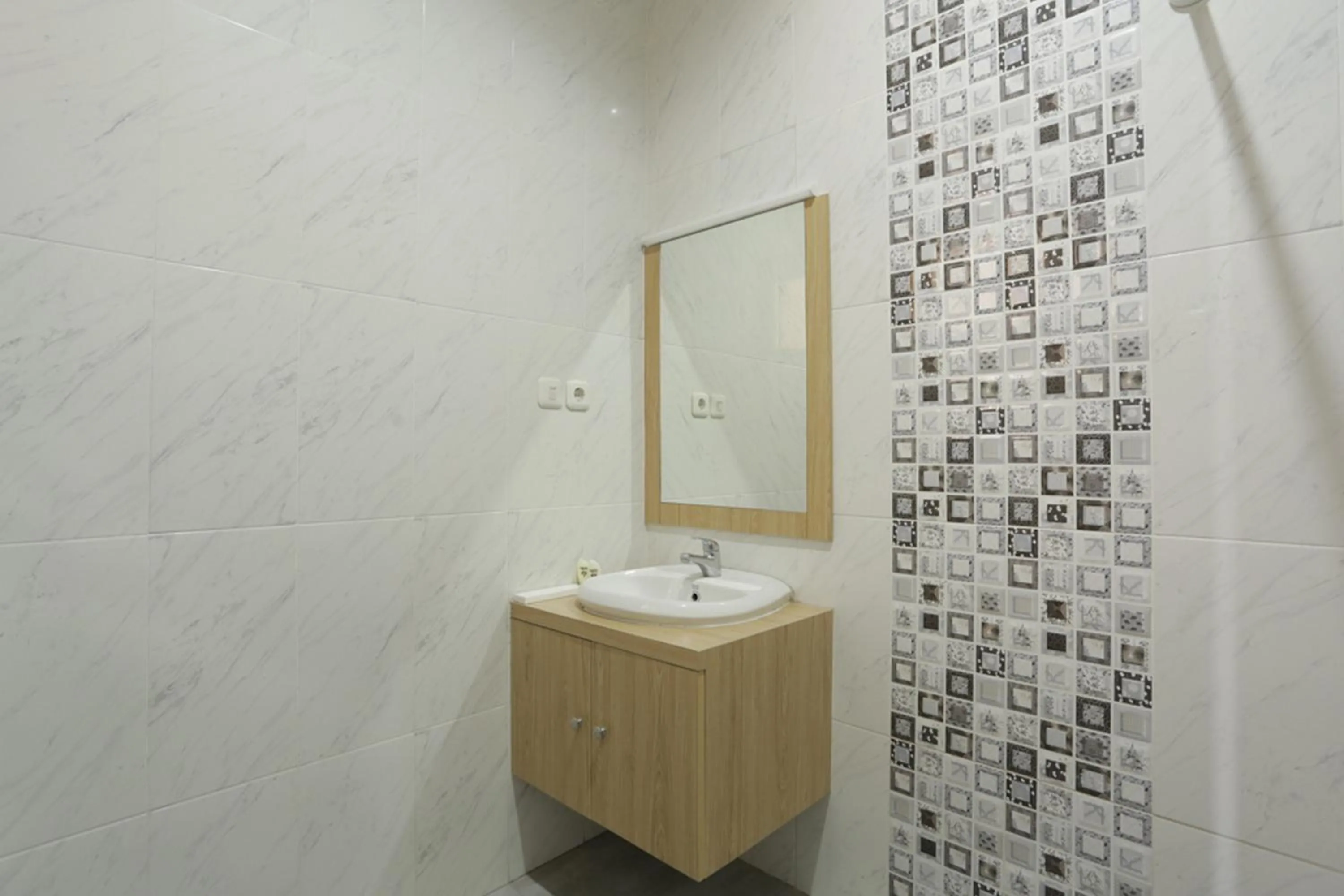 Bathroom in IDR Green Guest House Syariah Mitra RedDoorz