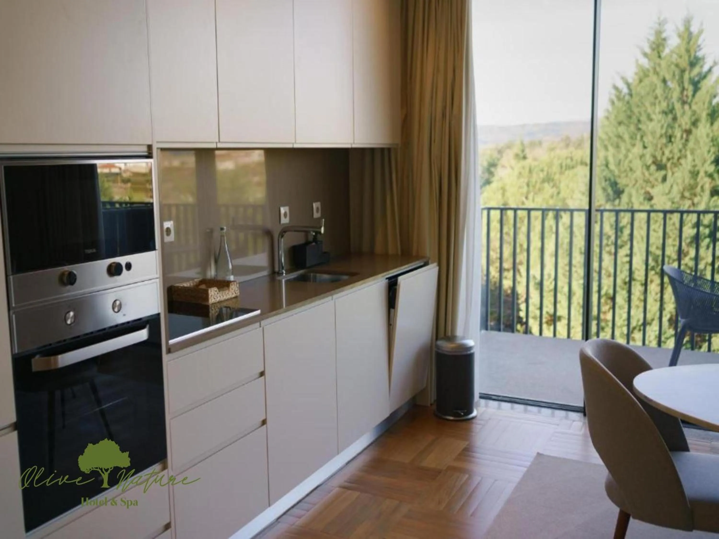 Kitchen or kitchenette in Olive Nature Hotel & SPA - Quinta Valle de Passos